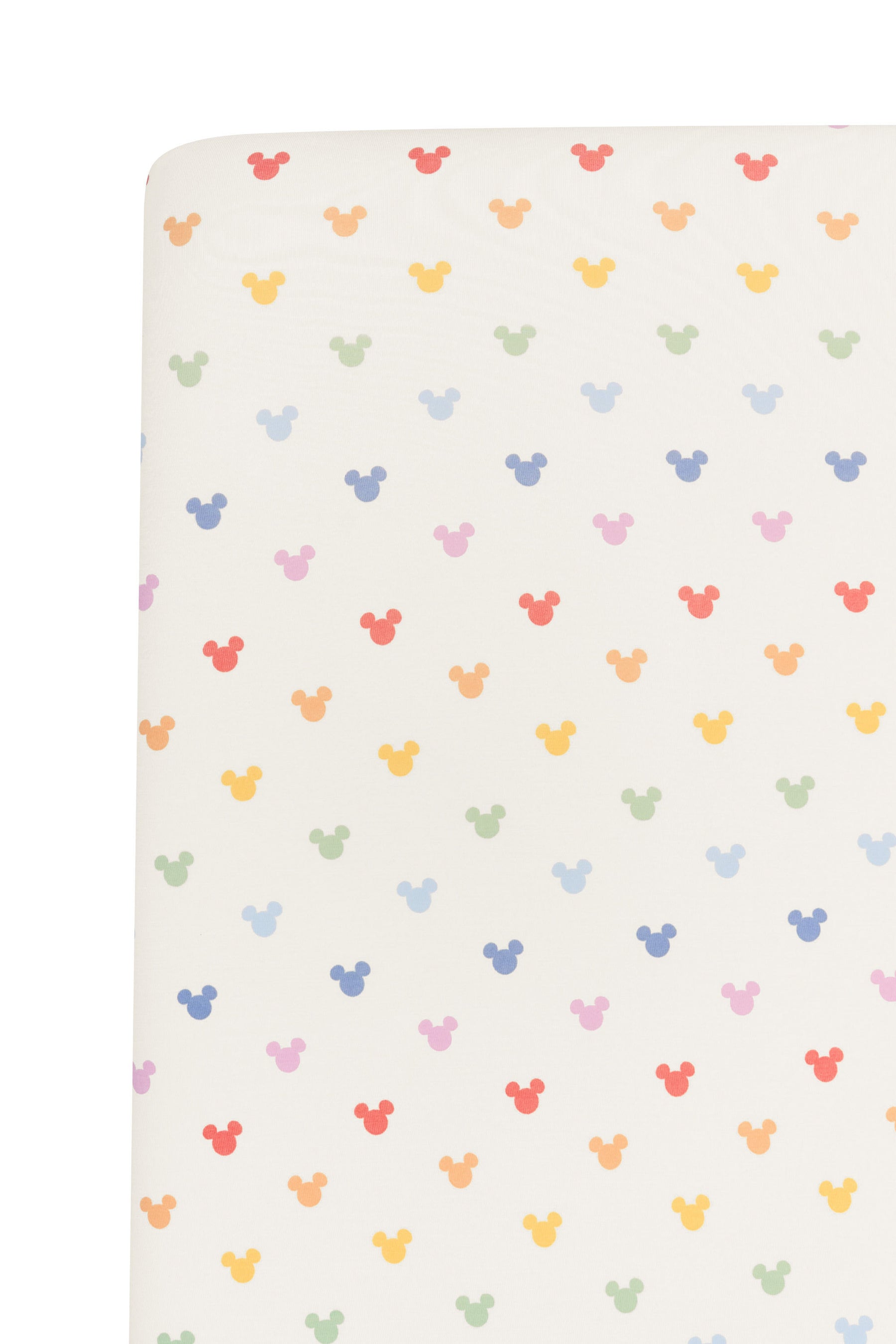 Fabric with pastel mickey mouse icons on an oat background