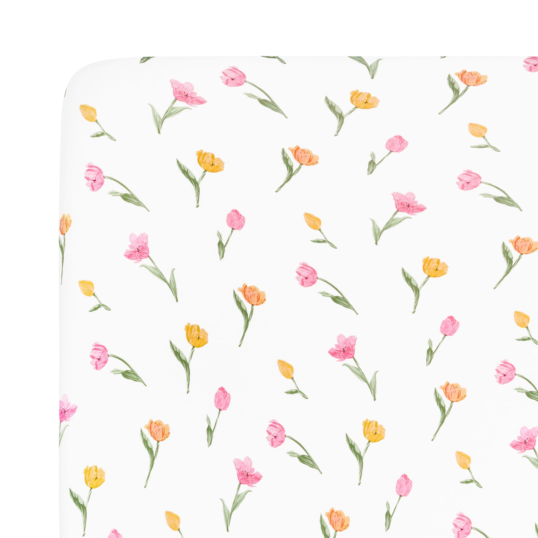 Corner of the Crib Sheet in Tulip shown on a mattress