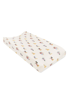 Change pad cover with mickey mouse and friends print on an oat background
