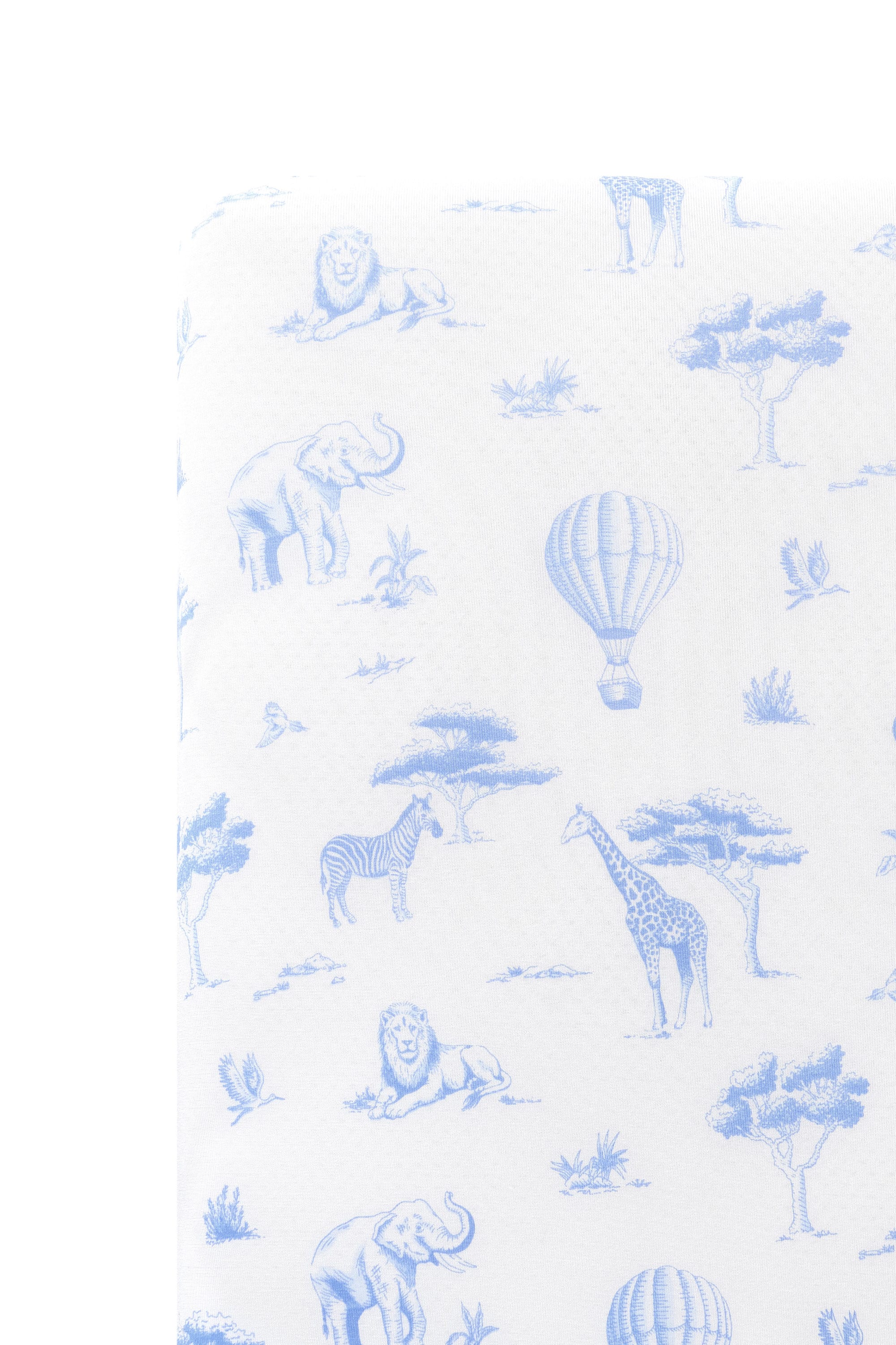 Close up of the Twin Sheet in Toile Safari on a mattress