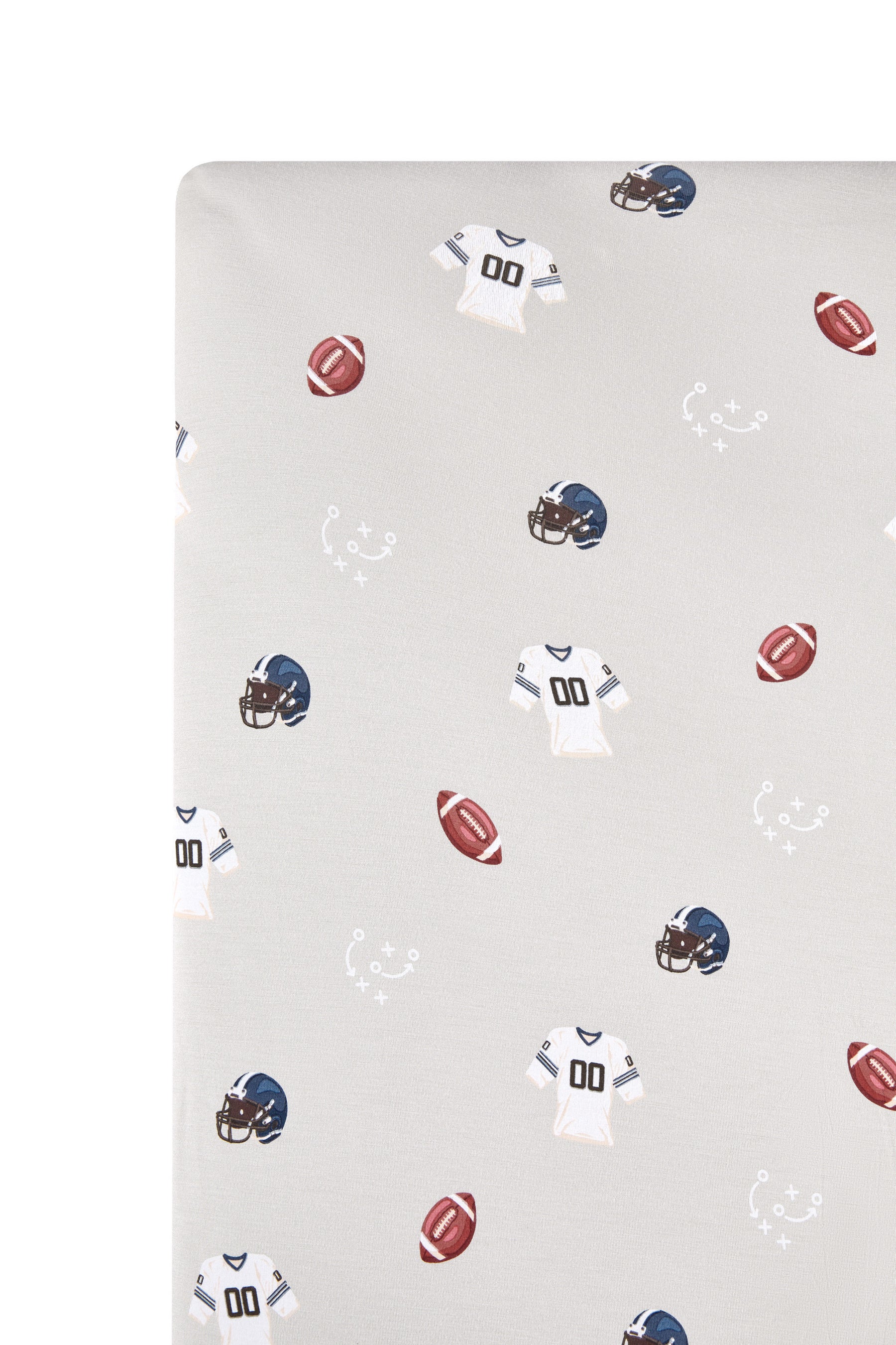 Close up of Twin Sheet in Vintage Football print on a white background