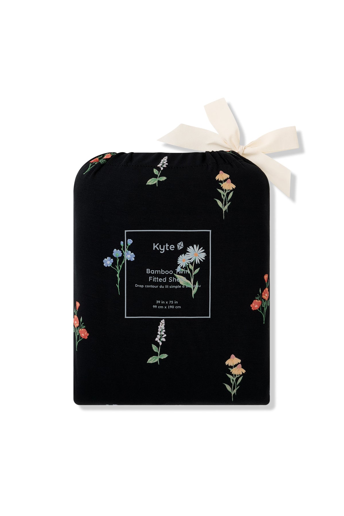 Twin Sheet in Wildflower print packed in a black bag with wildflower print on it on a white background
