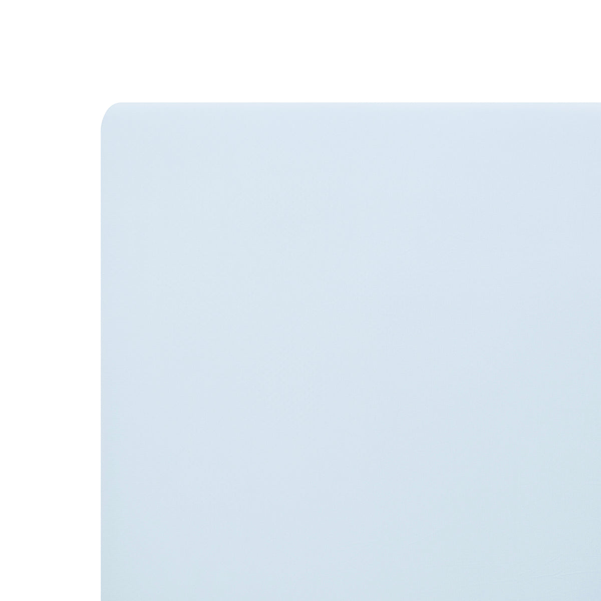 Close up of corner of the Twin Sheet in Breeze shown on a mattress
