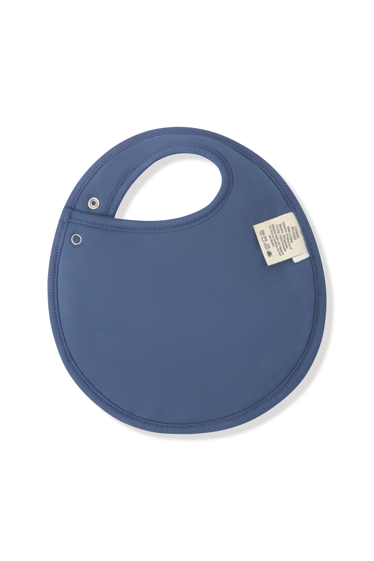Back side of Cushy Bib in Oxford on a white background