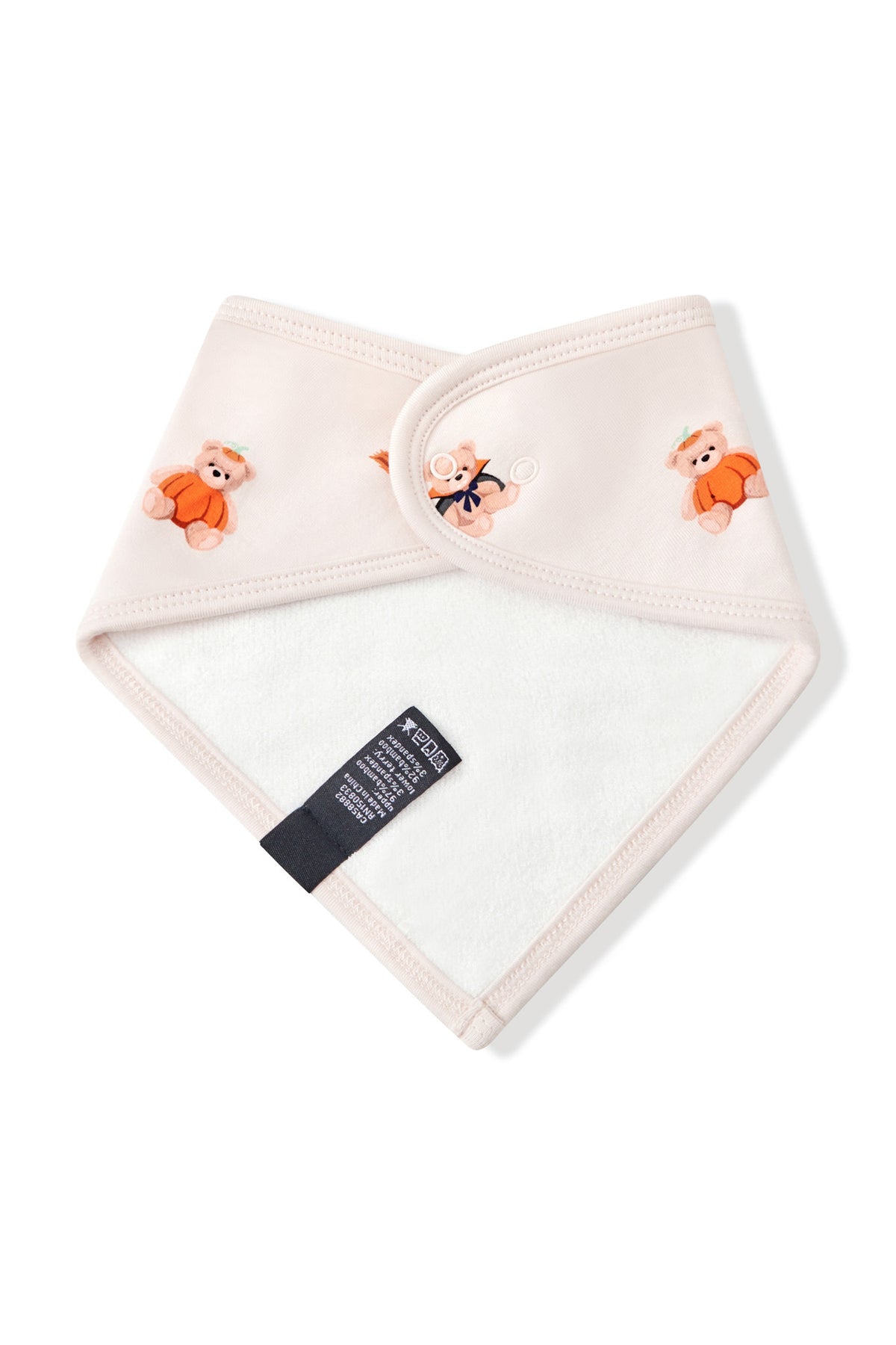 Back side of Beige Bib in Halloween Teddy print on a white background