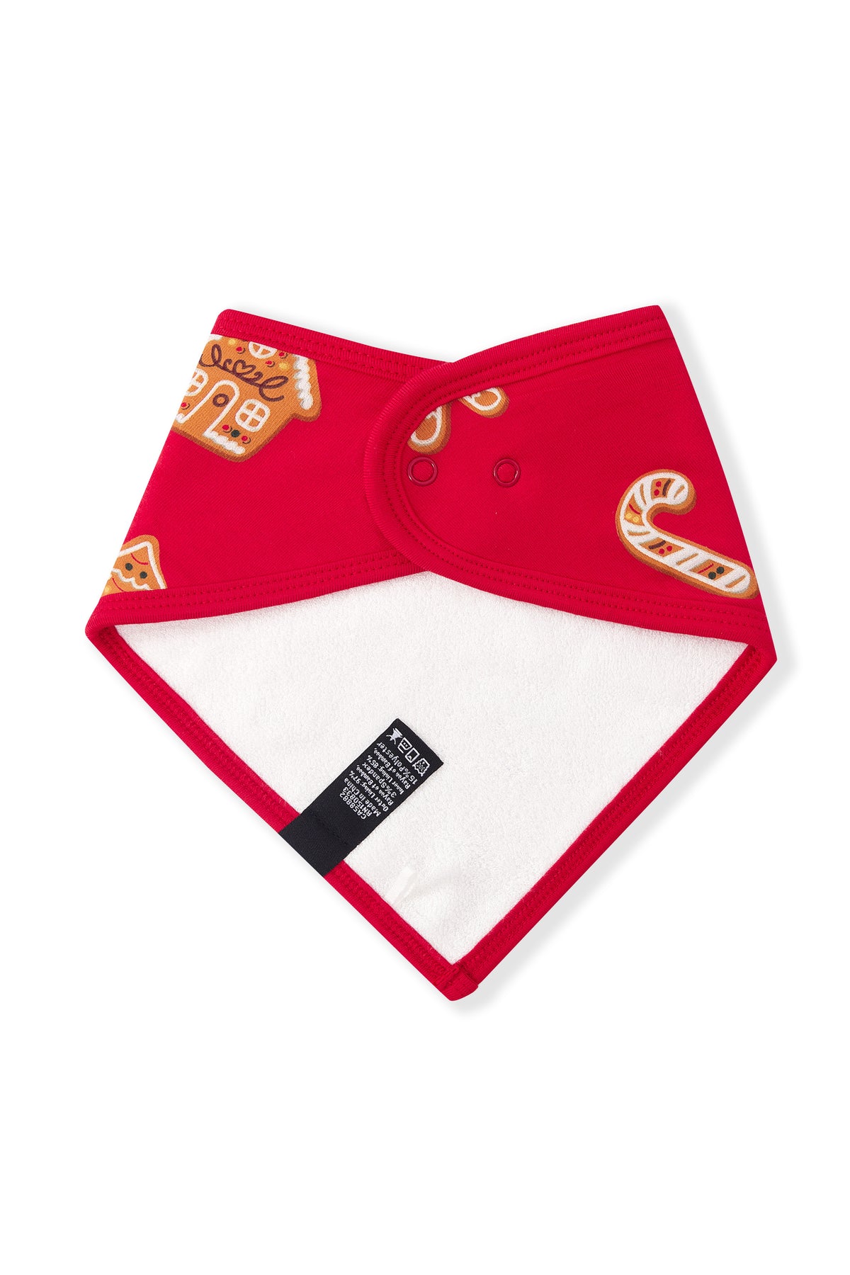 A red baby bib with a white reverse side, decorated with gingerbread man and candy cane graphics, shown on a plain white background.