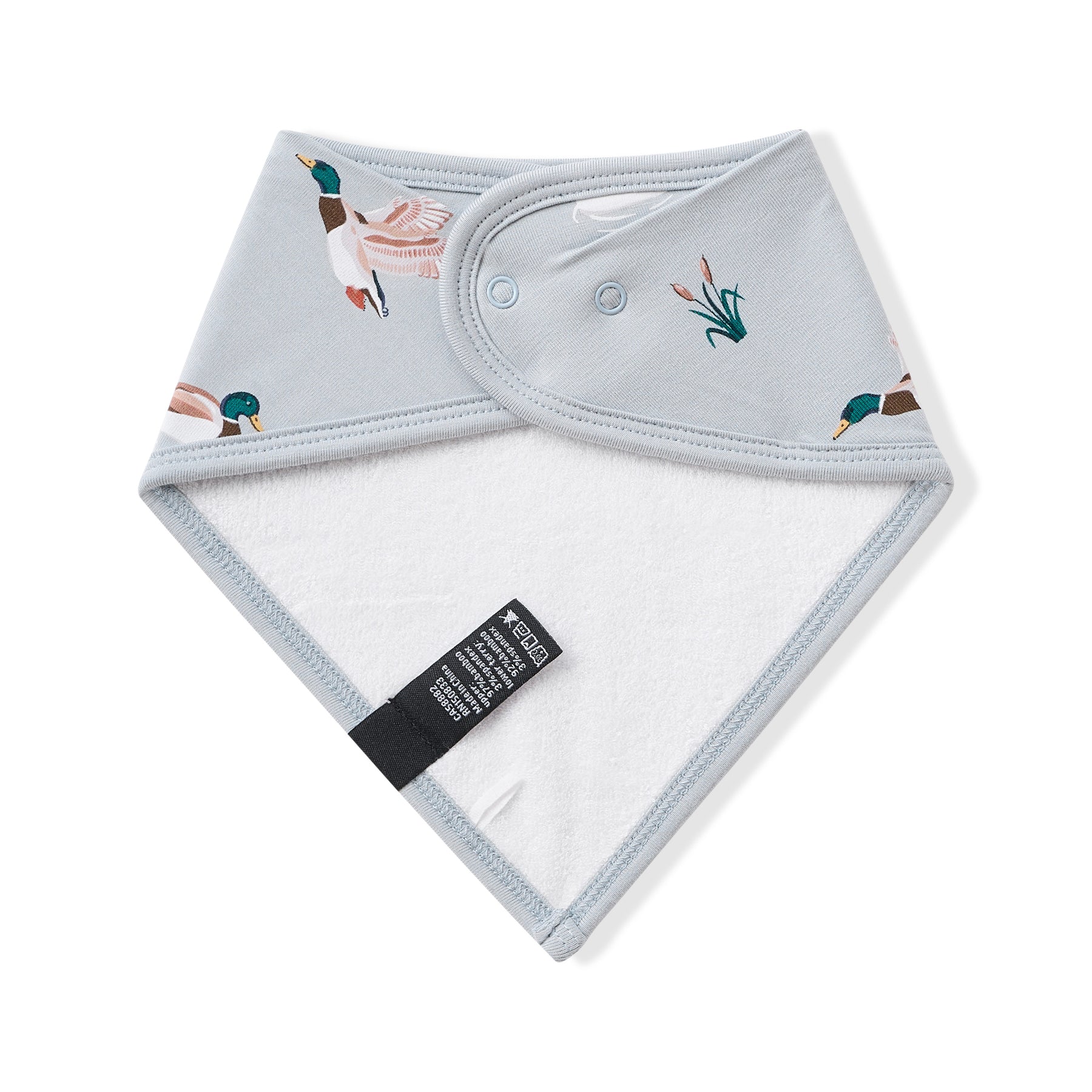 The back of the Bib in Mallard Duck showing the snap closures and bamboo terry cloth backing