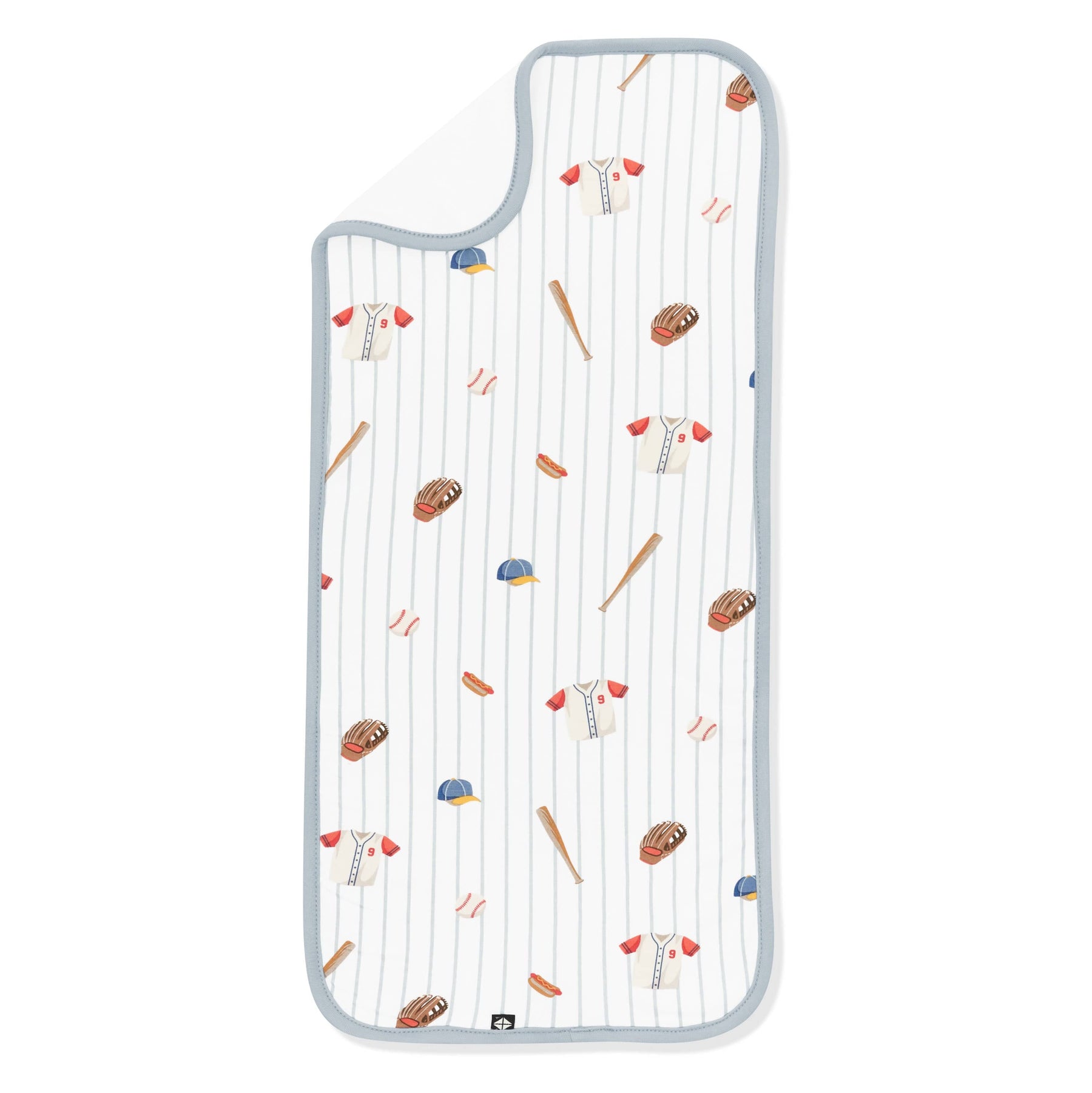 Burp Cloth in Home Run laid flat with the corner flipped down showing the bamboo terry cloth backing