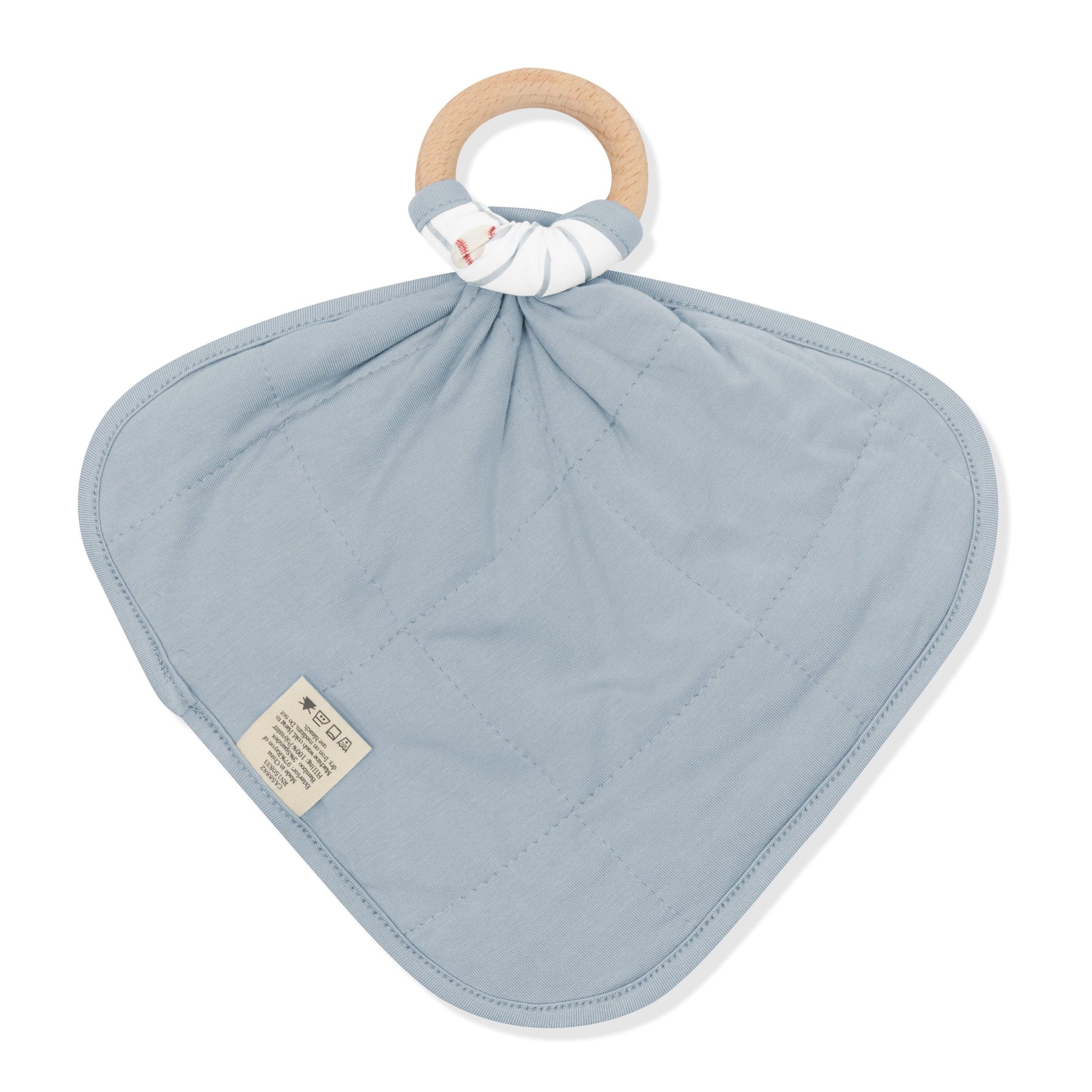 The back of the Lovey in Home Run with Removable Wooden Teething Ring showing the quilted backing attached to a wooden ring