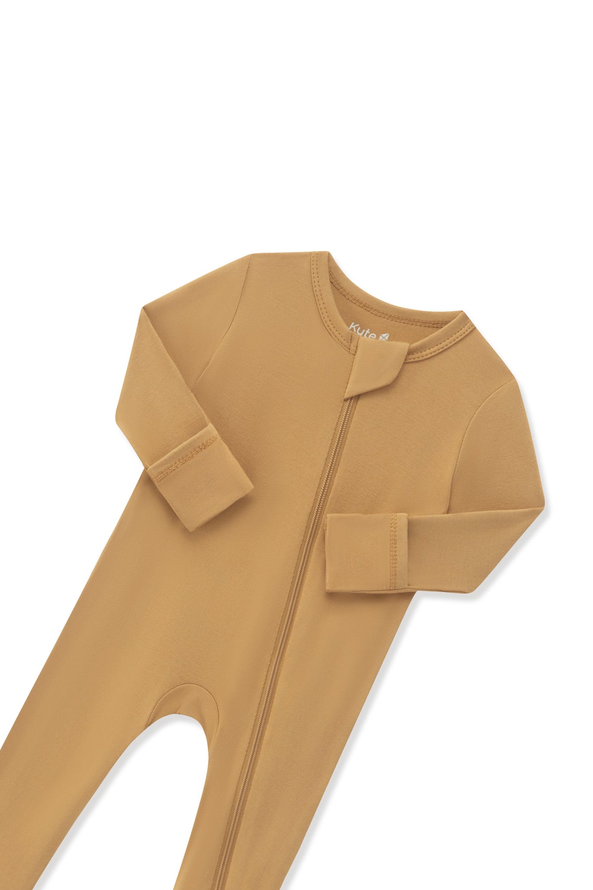 Close up of the zipper garage and fold over hand cuffs on the Zippered Romper in Ochre on a white background