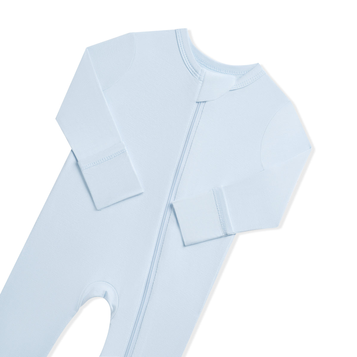Close up of the zipper garage and fold over hand cuffs on the Zippered Romper in Breeze
