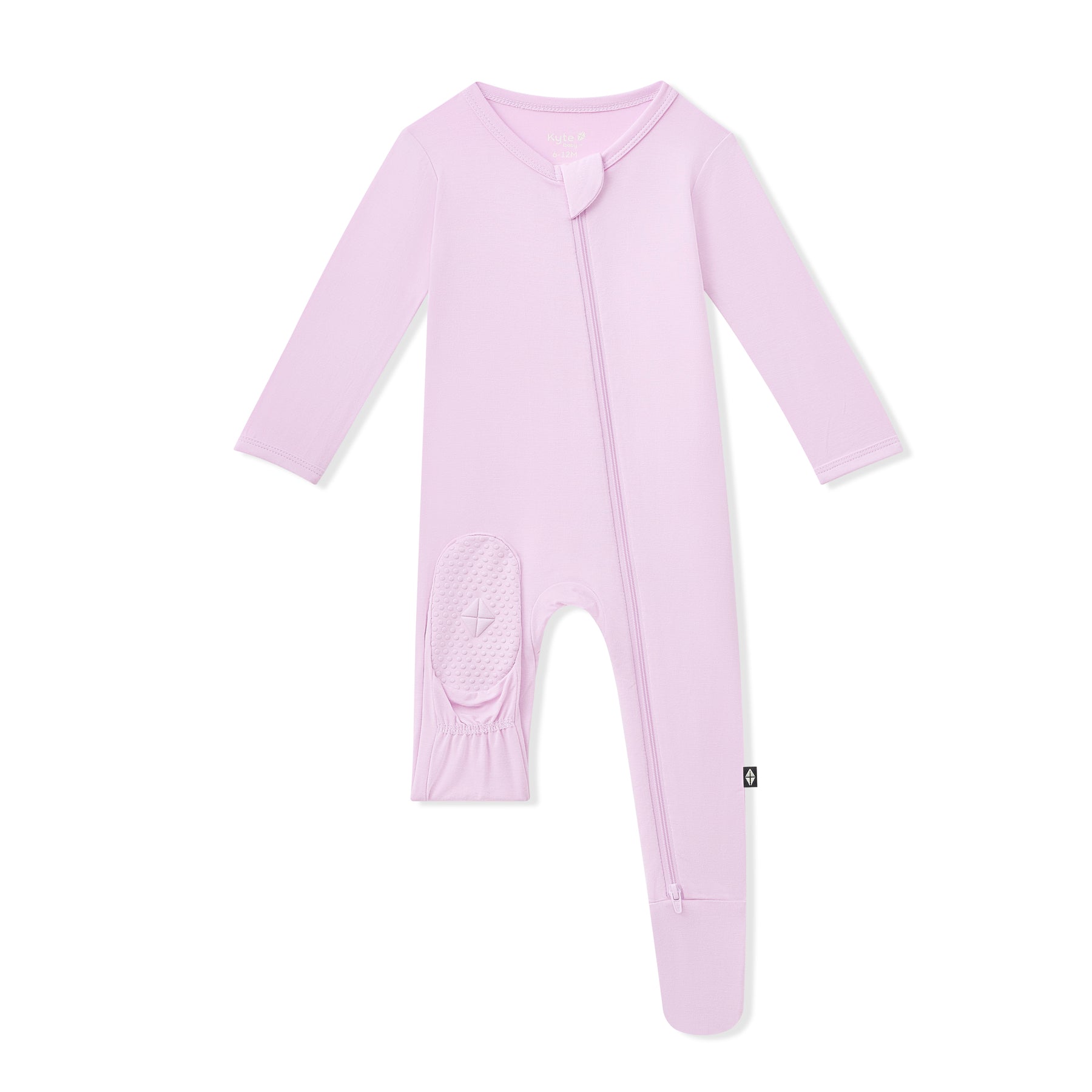 Purple baby footie with sole grips on the foot a white background