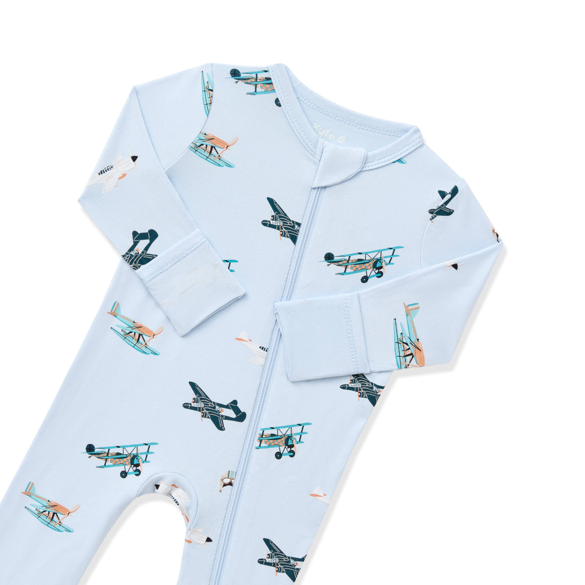 Close up of zipper garage and fold over hand cuffs on the Zippered Romper in Take Off