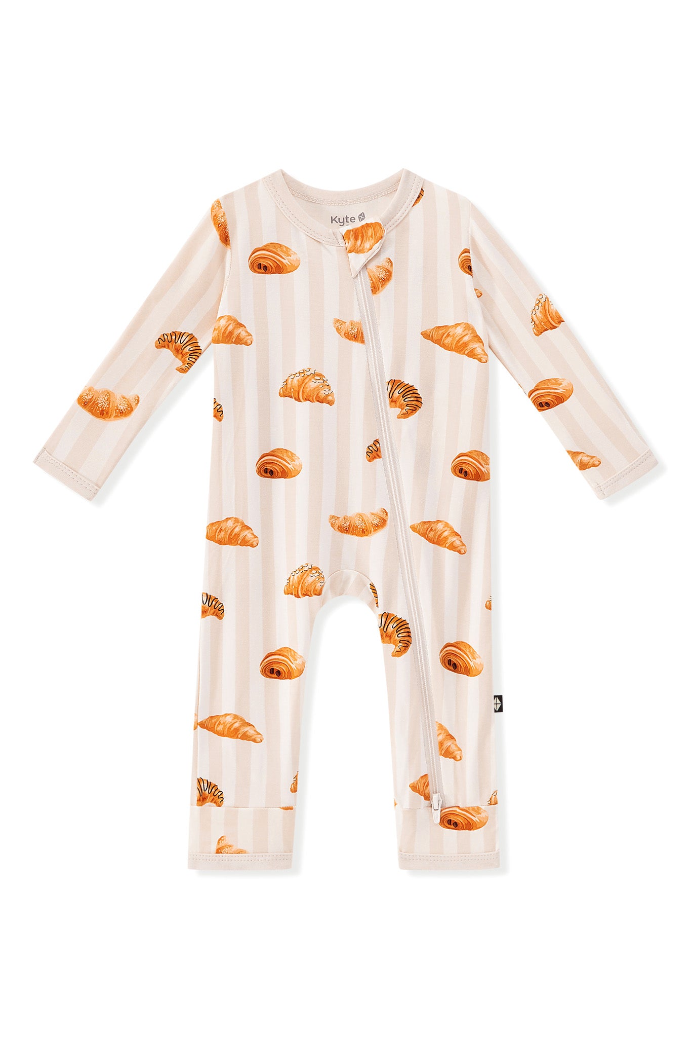 Zippered Romper in Croissant print on a white background