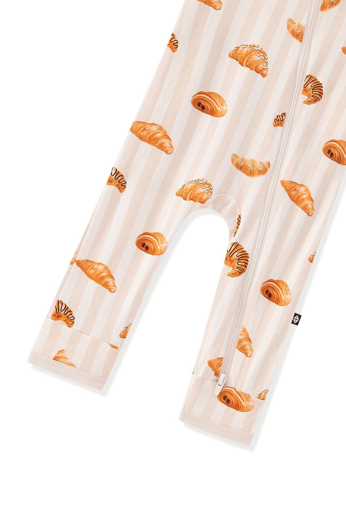 Bottom part of Zippered Romper in Croissant print on a white background