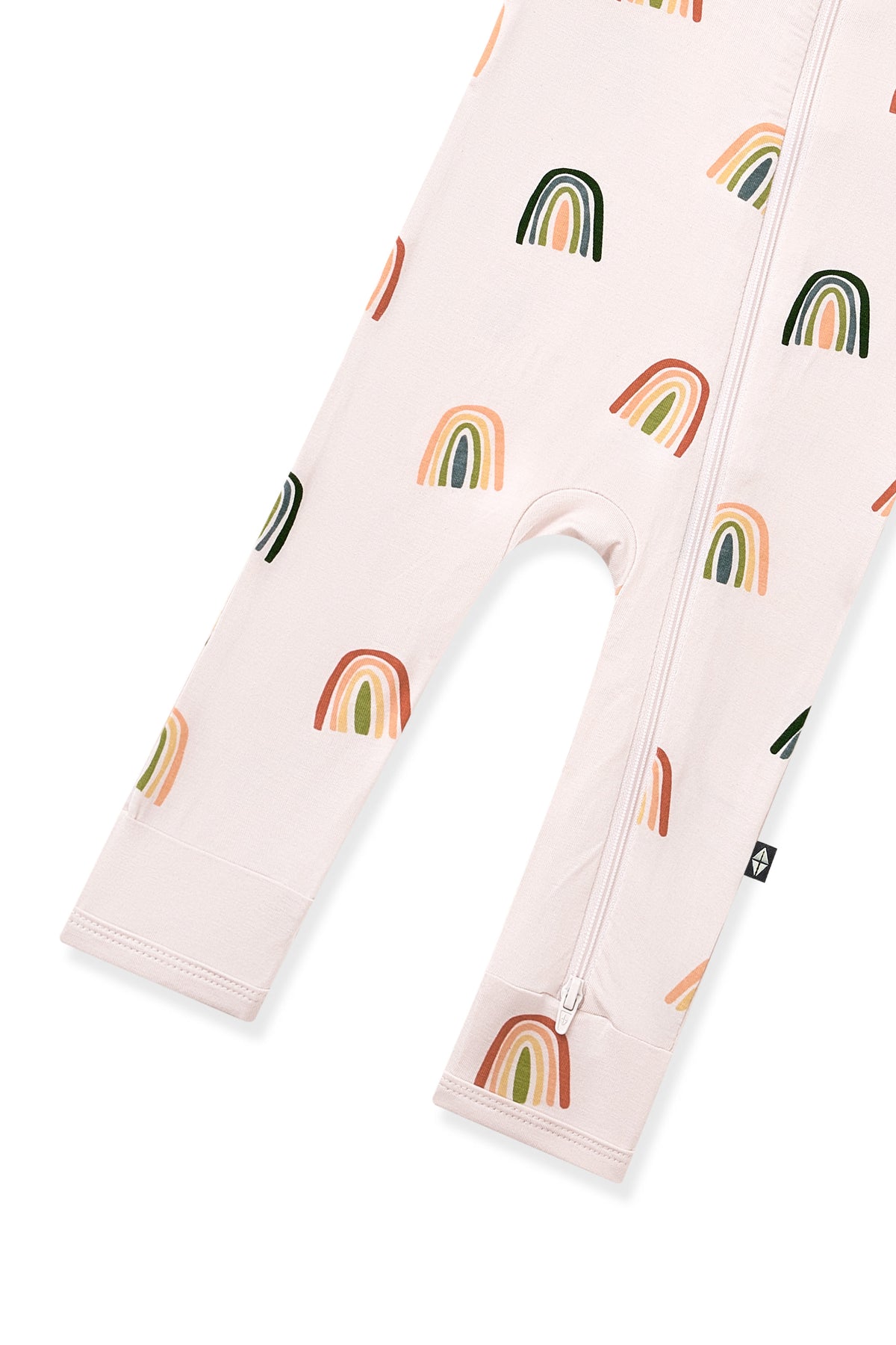 Bottom part of Vanilla Cream Zippered Romper in Retro Rainbow print on a white background