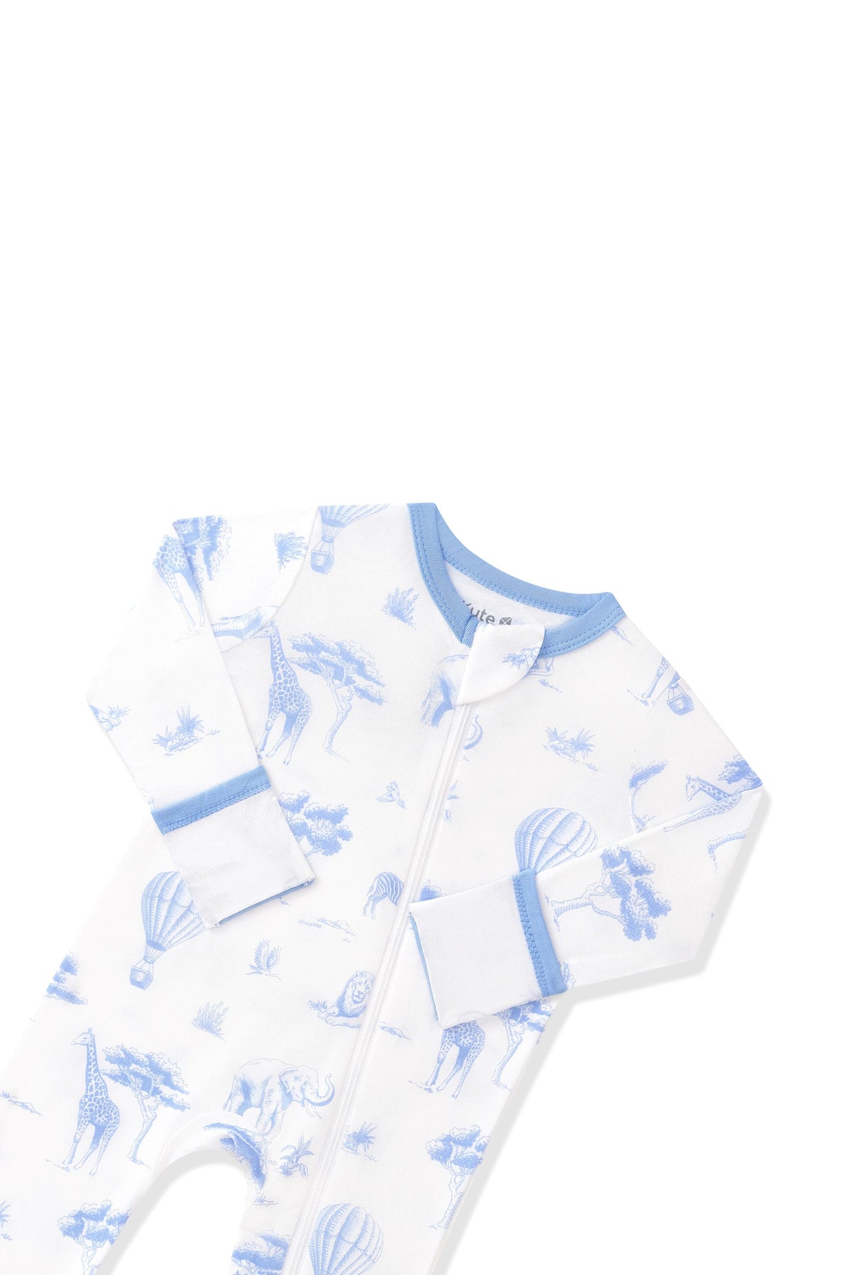 Close up of the zipper garage and fold over hand cuffs shown on the Zippered Romper in Toile Safari
