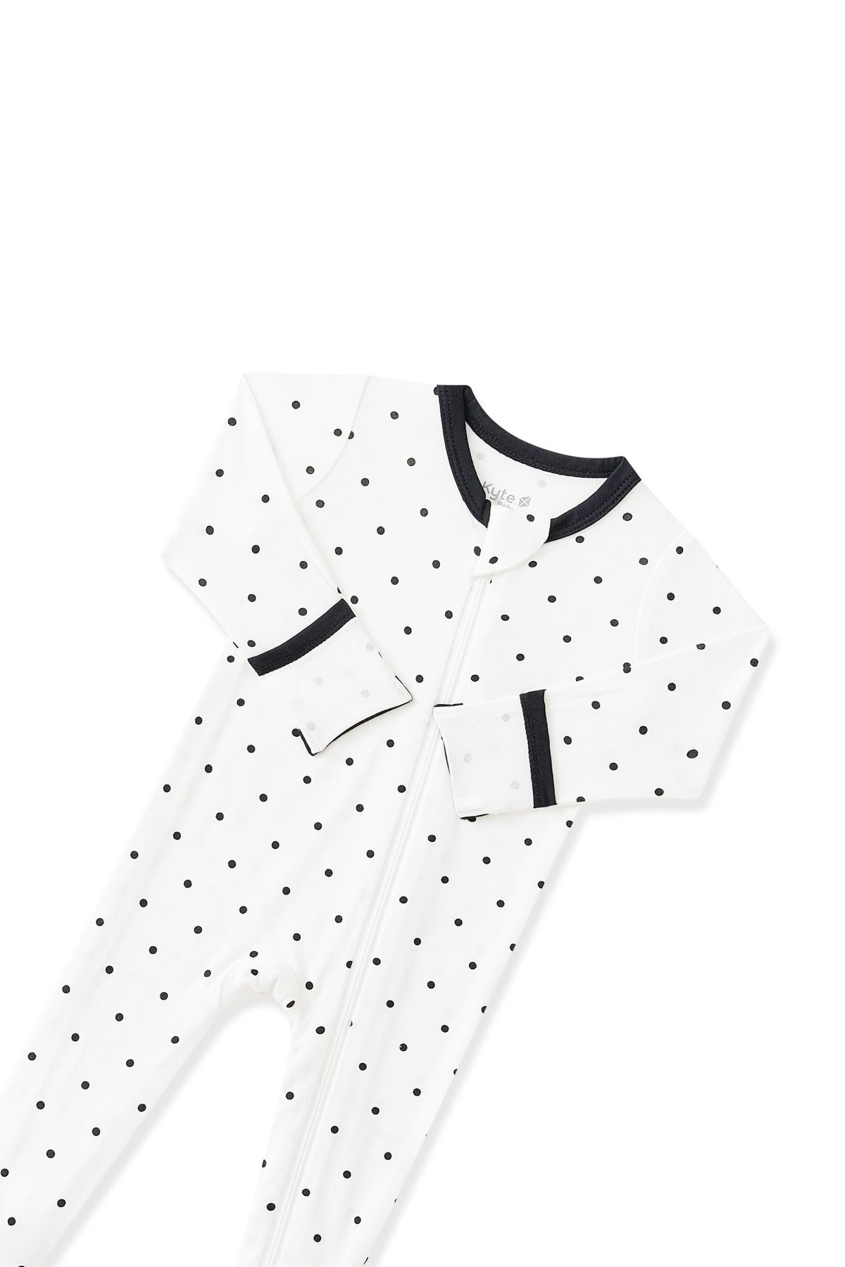 Top part of Zippered Footie in Midnight Polka Dot with black trim white background