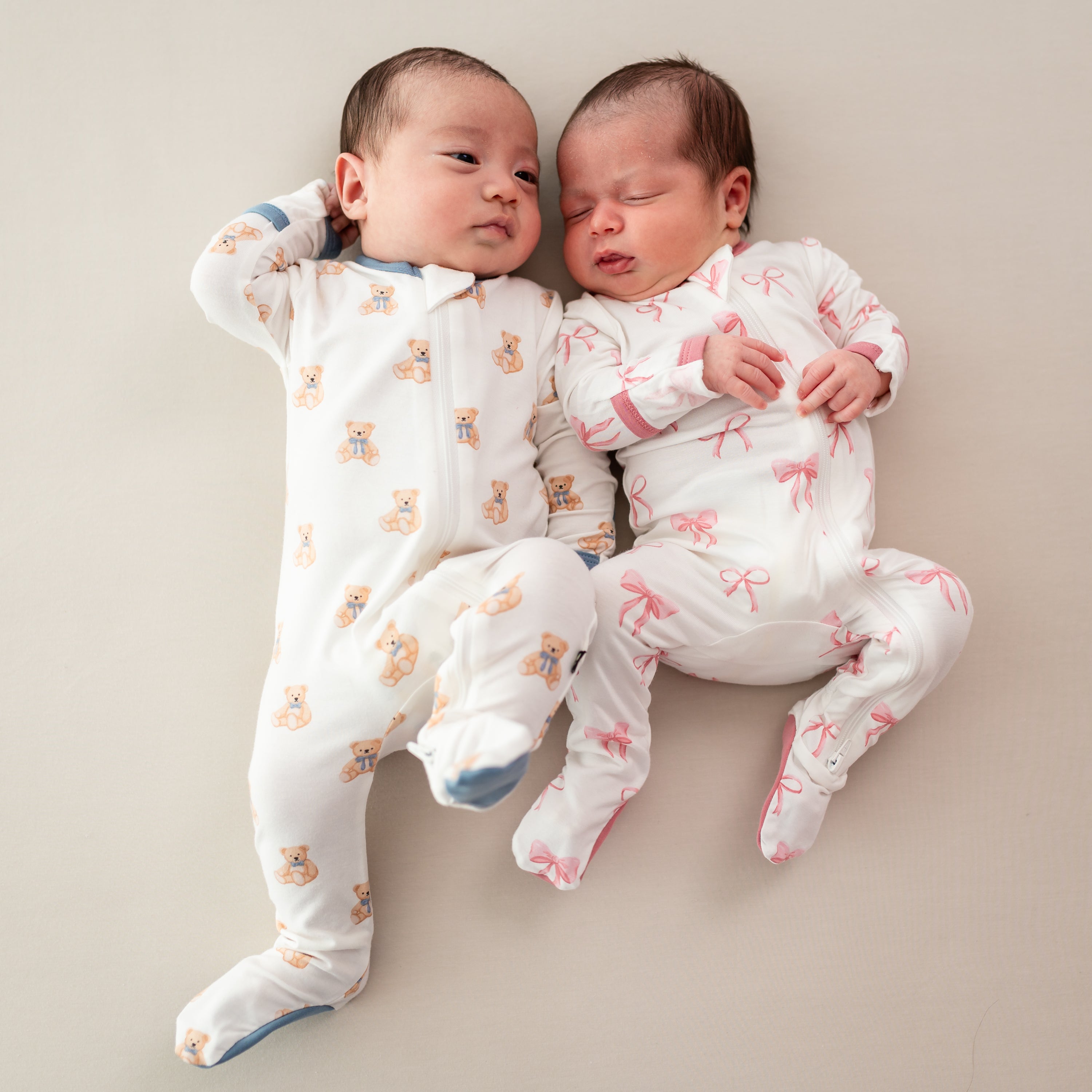 Babies wearing Zippered Footies in Teddy Bear and Bow