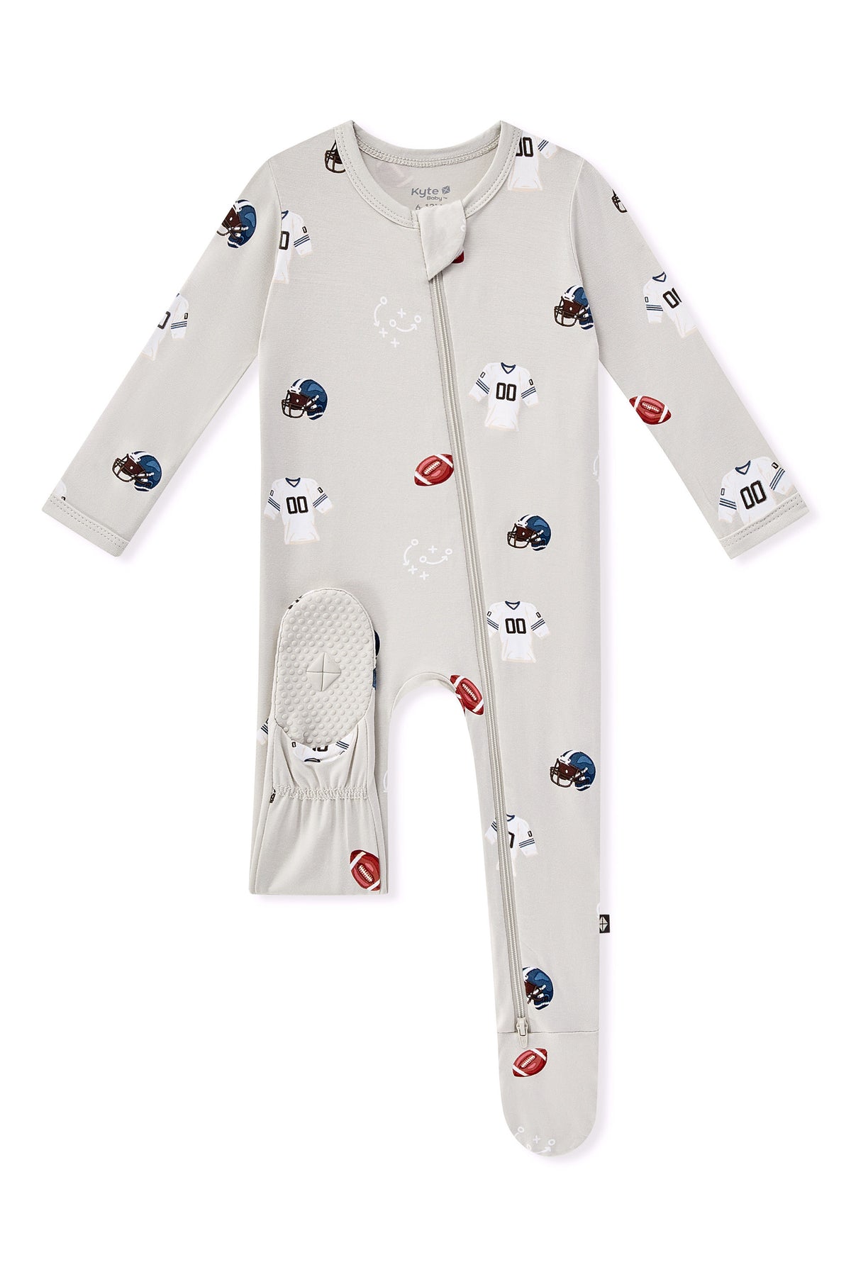 Zippered Footie in Vintage Football print with dotted footie on a white background