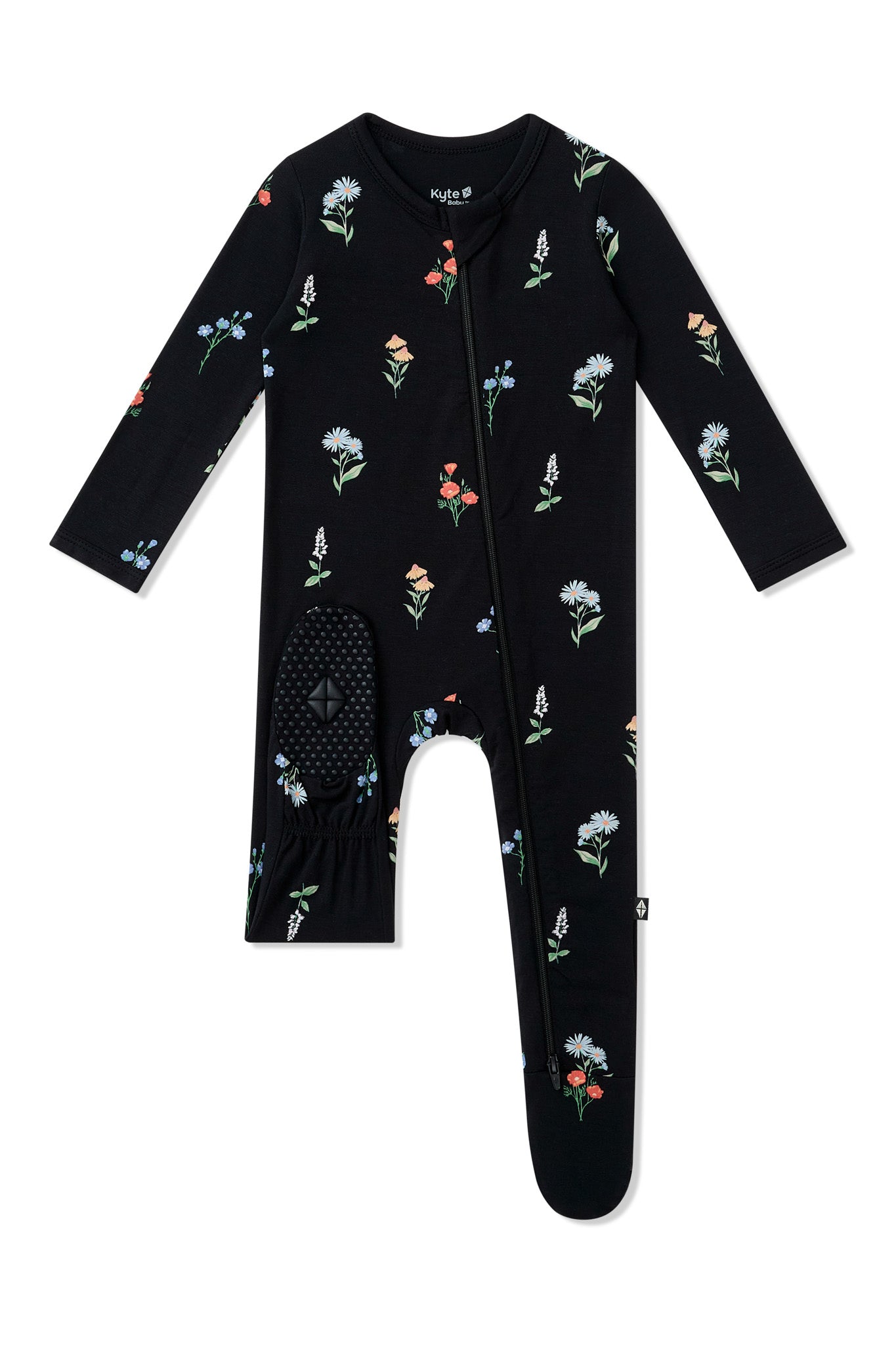 Dotted footie on Black Zippered Footie in Wildflower print on a white background