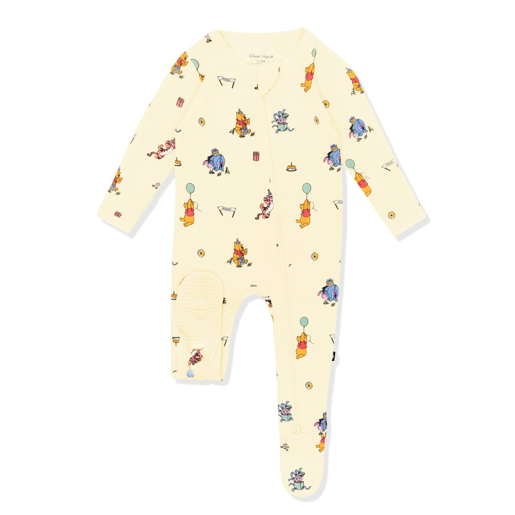 Yellow foot pad shown on the Zippered Footie in Winnie the Pooh Celebration