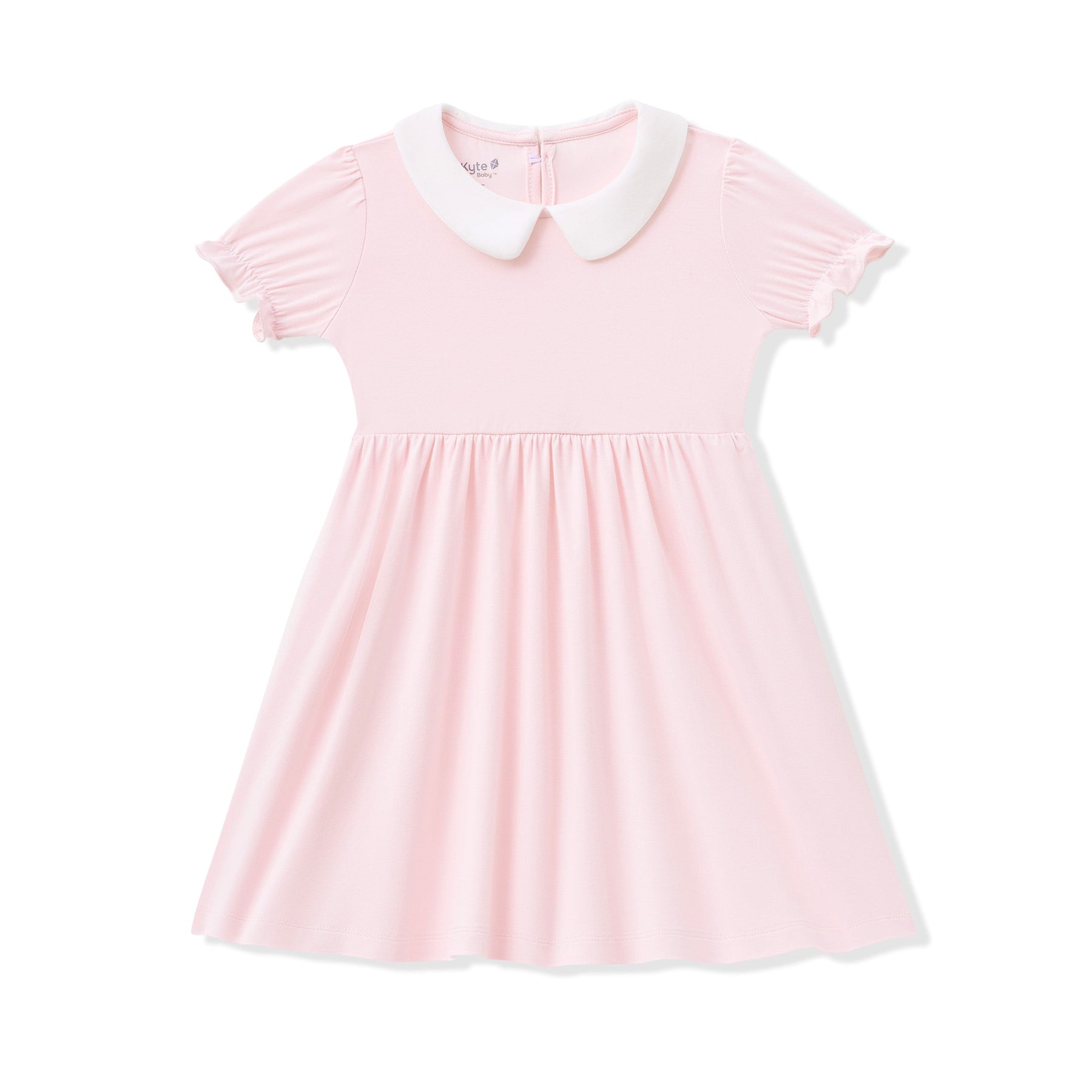 Pink dress with a white collar on a white background
