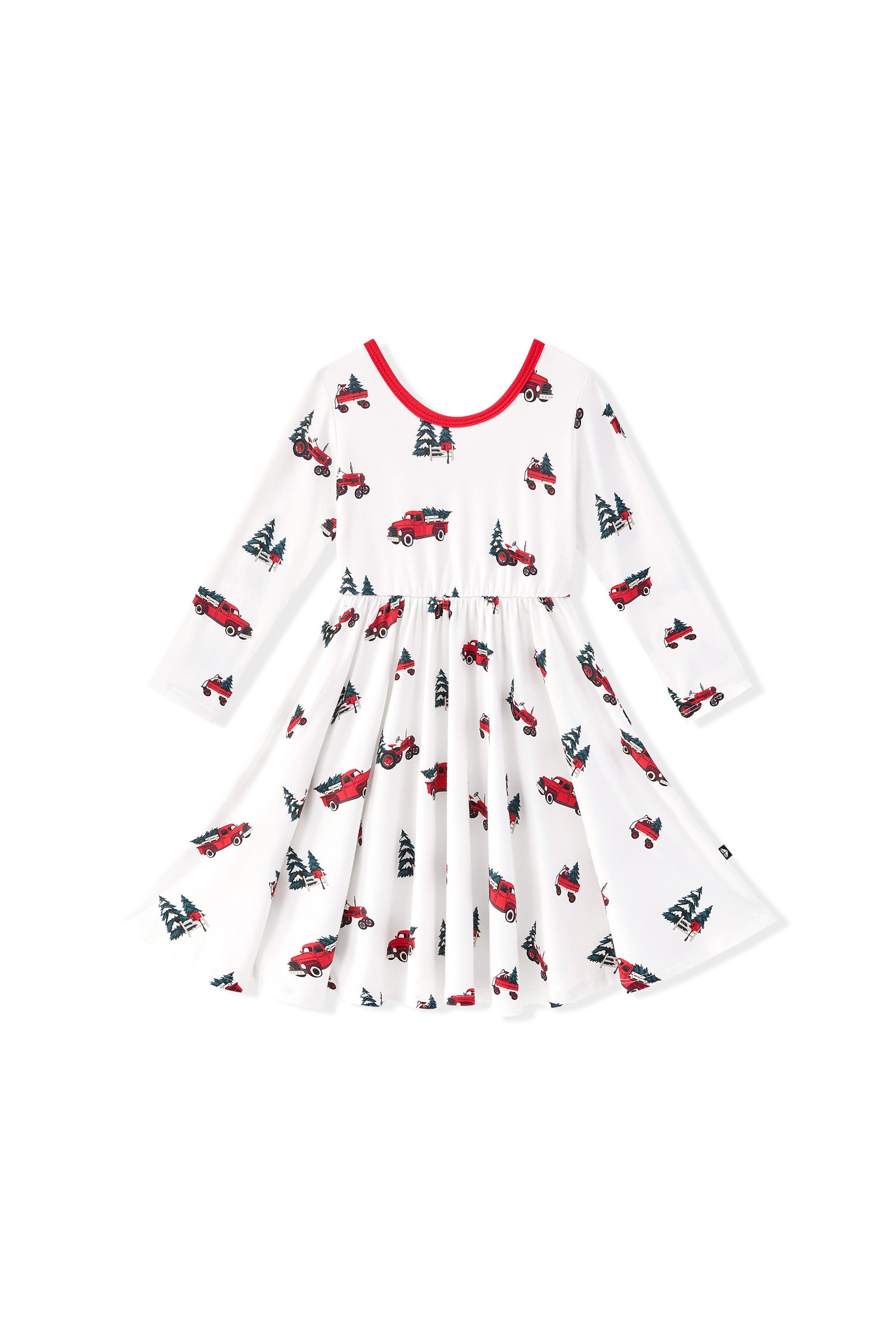 A white long sleeve twirl dress with a red crew neck trim and an all-over print of red fire trucks and green trees, shown flat on a white background.