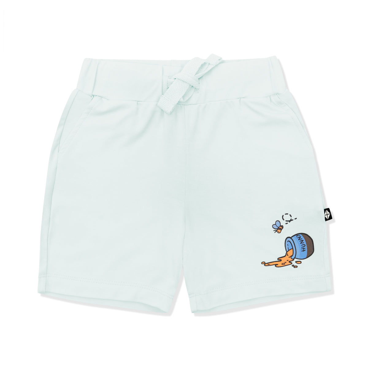 Light green drawstring shorts showing a honey pot tipped over with honey coming out on the right leg