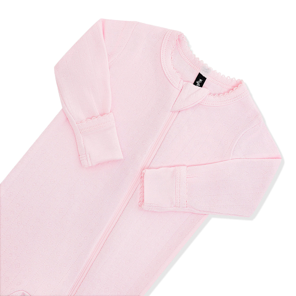 Close up of the picot trim, zipper garage and fold over hand cuffs shown on the Pointelle Zippered Footie in Sakura