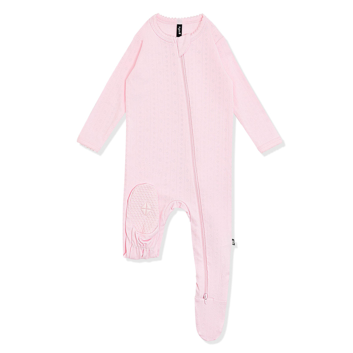 The bottom of the foot pad with the kyte baby log shown on the Pointelle Zippered Footie in Sakura