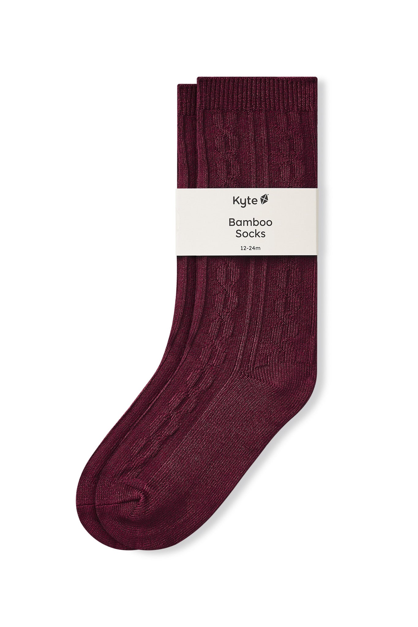 Knee high socks in burgundy laying flat on a white background.