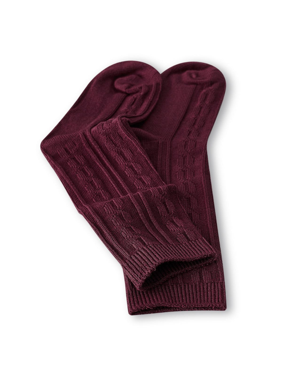 Knee high socks in burgundy laying flat on a white background.