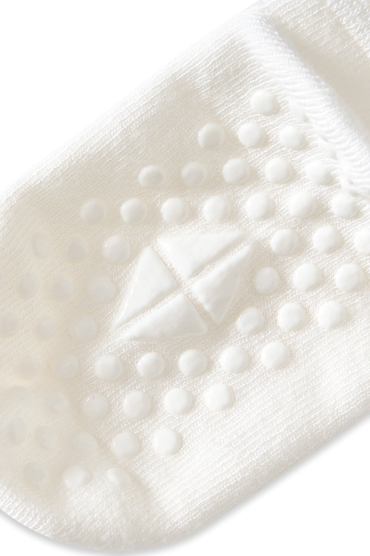 Bottom of Kyte sock with grips.