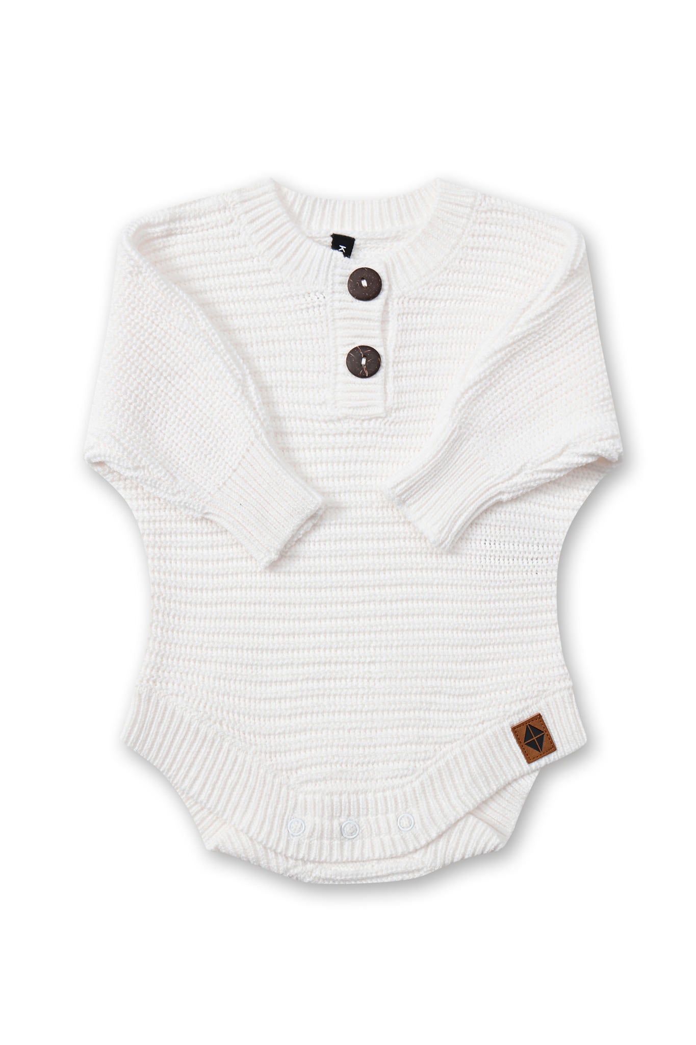 Chunky Knit Romper in cloud with folded sleeves on a white background