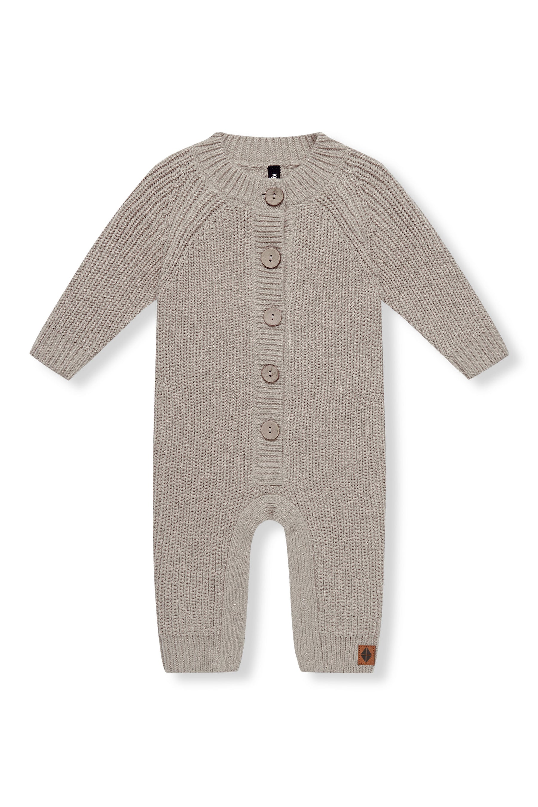 Chunky Knit Jumpsuit in Almond with buttons on a white background