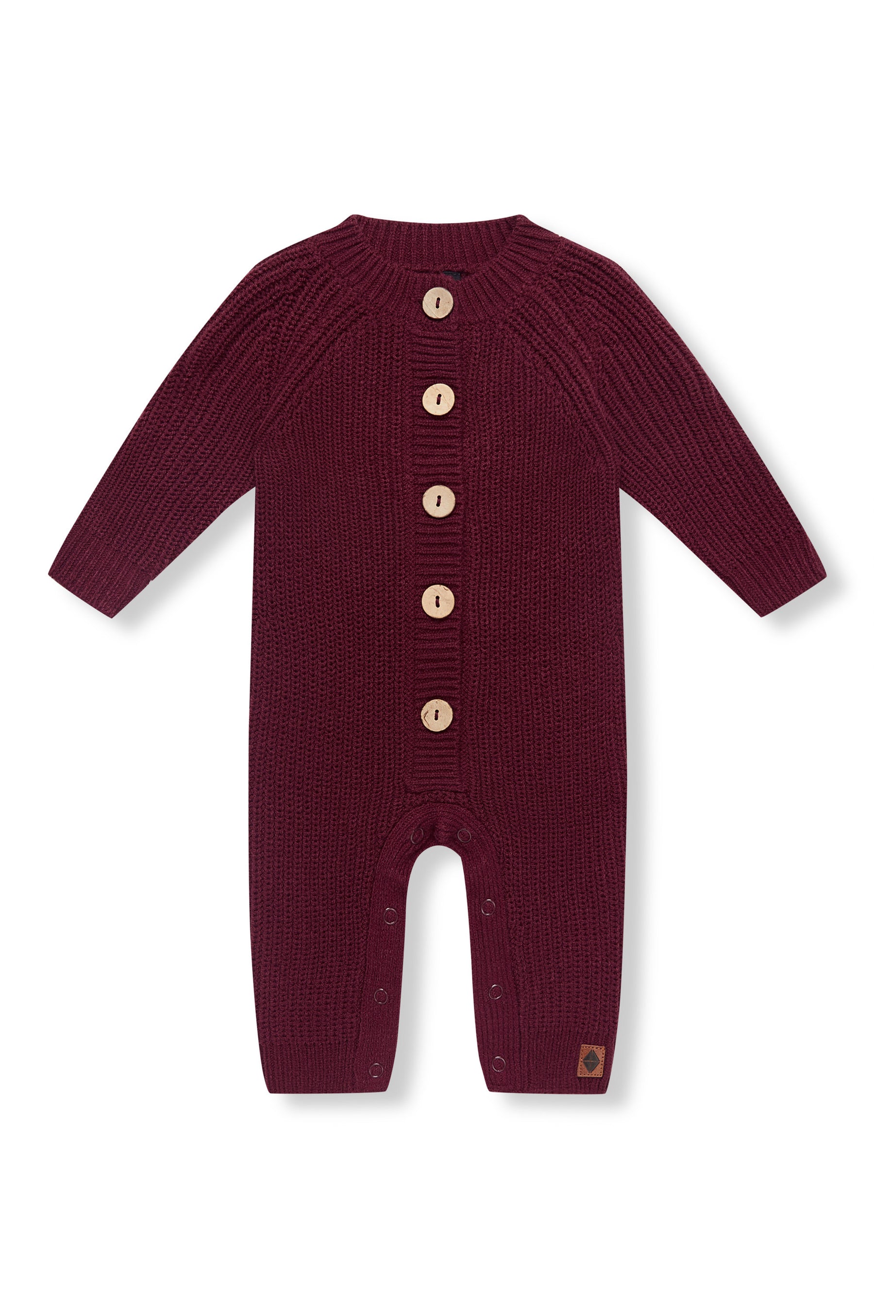 Chunky Knit Jumpsuit in Burgundy with buttons on a white background