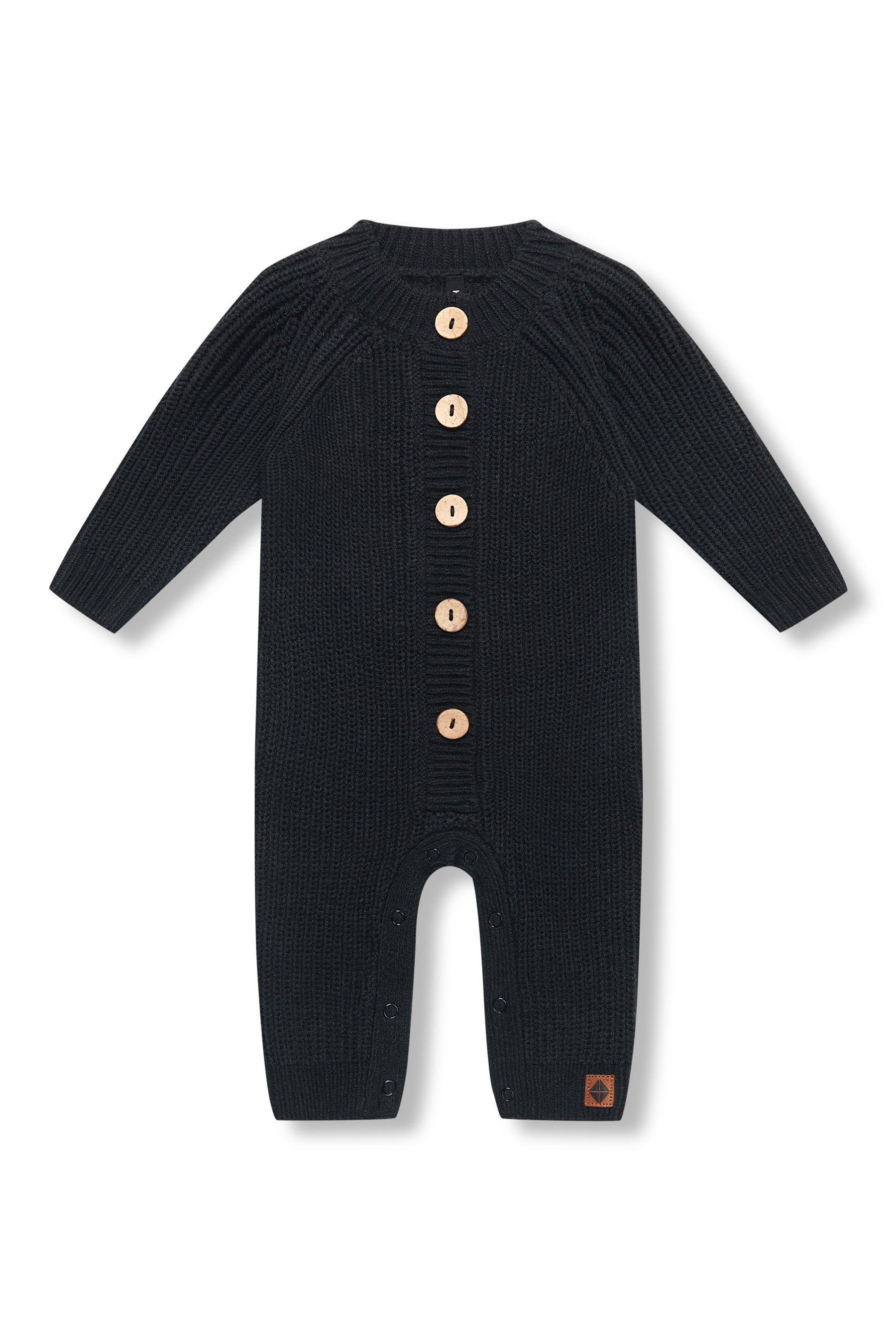 Chunky Knit Jumpsuit in Midnight with buttons on a white background