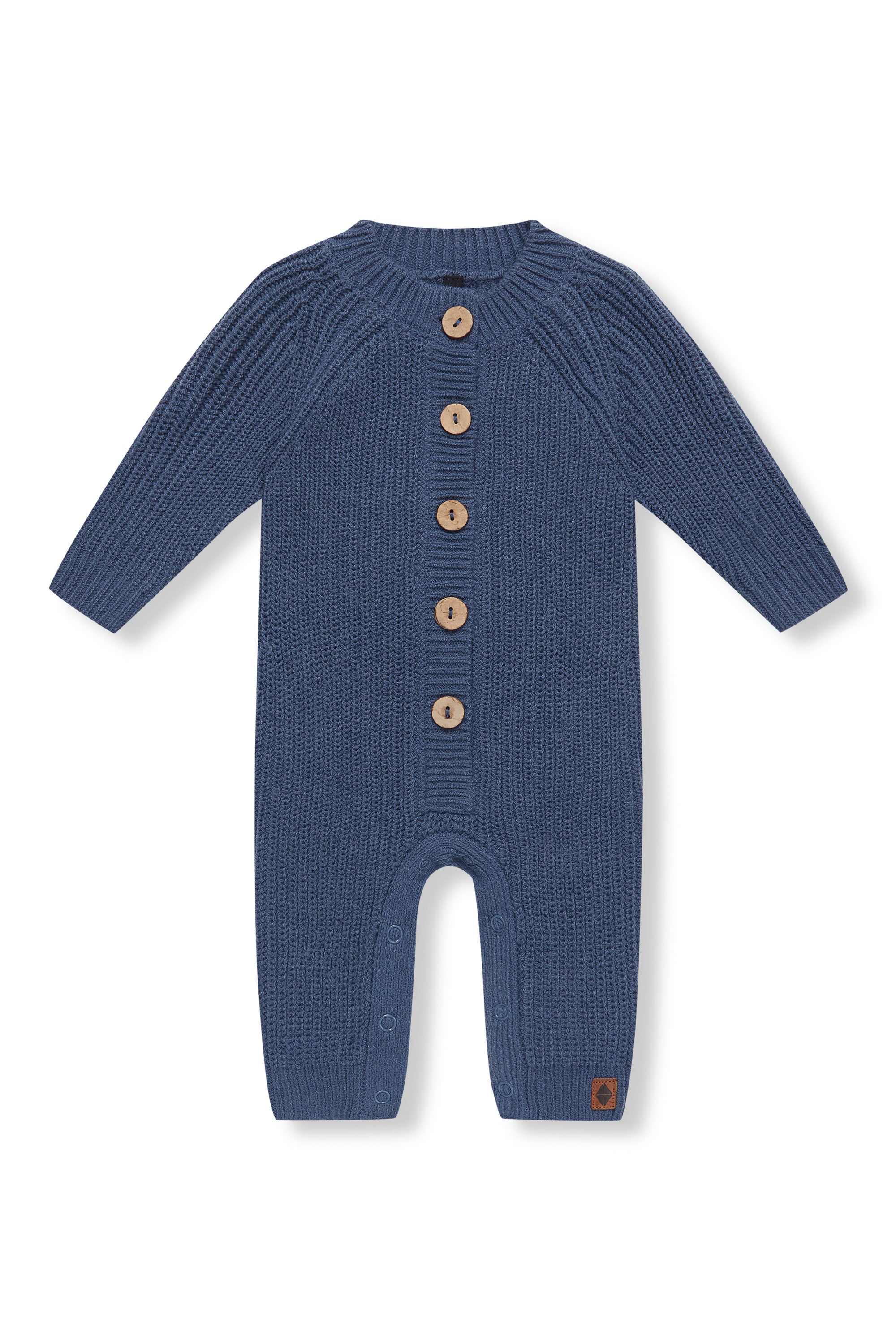 Chunky Knit Jumpsuit in oxford with buttons on a white background