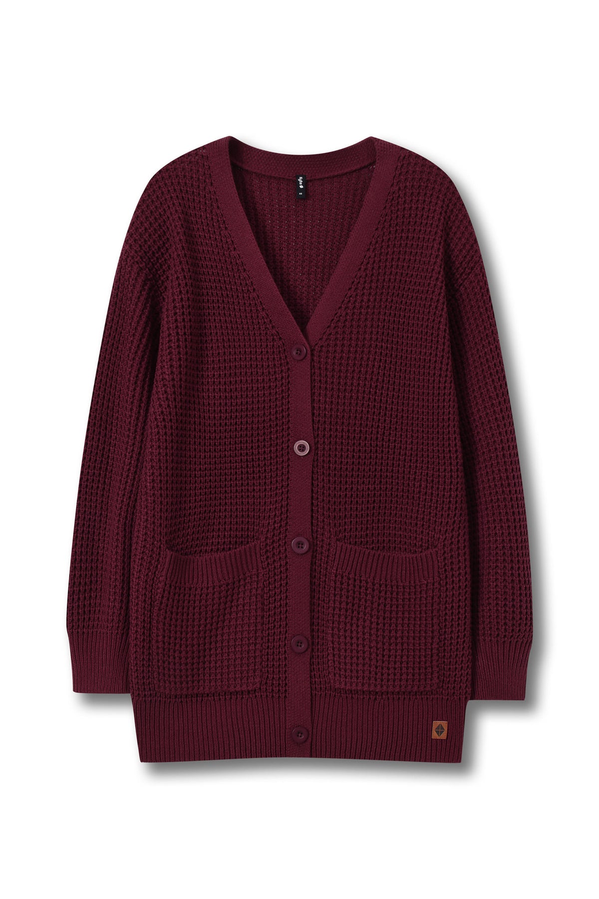 A burgundy waffle-knit cardigan sweater with a V-neck, button-front closure, and two front patch pockets, shown flat against a white background.