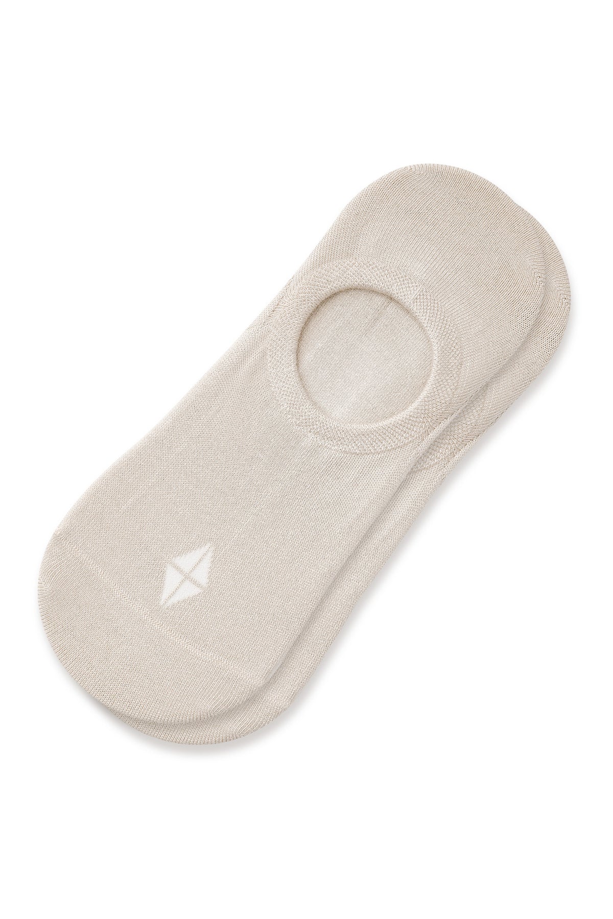 A single beige no-show sock with a small white geometric logo on the toe, displayed on a clean white background.