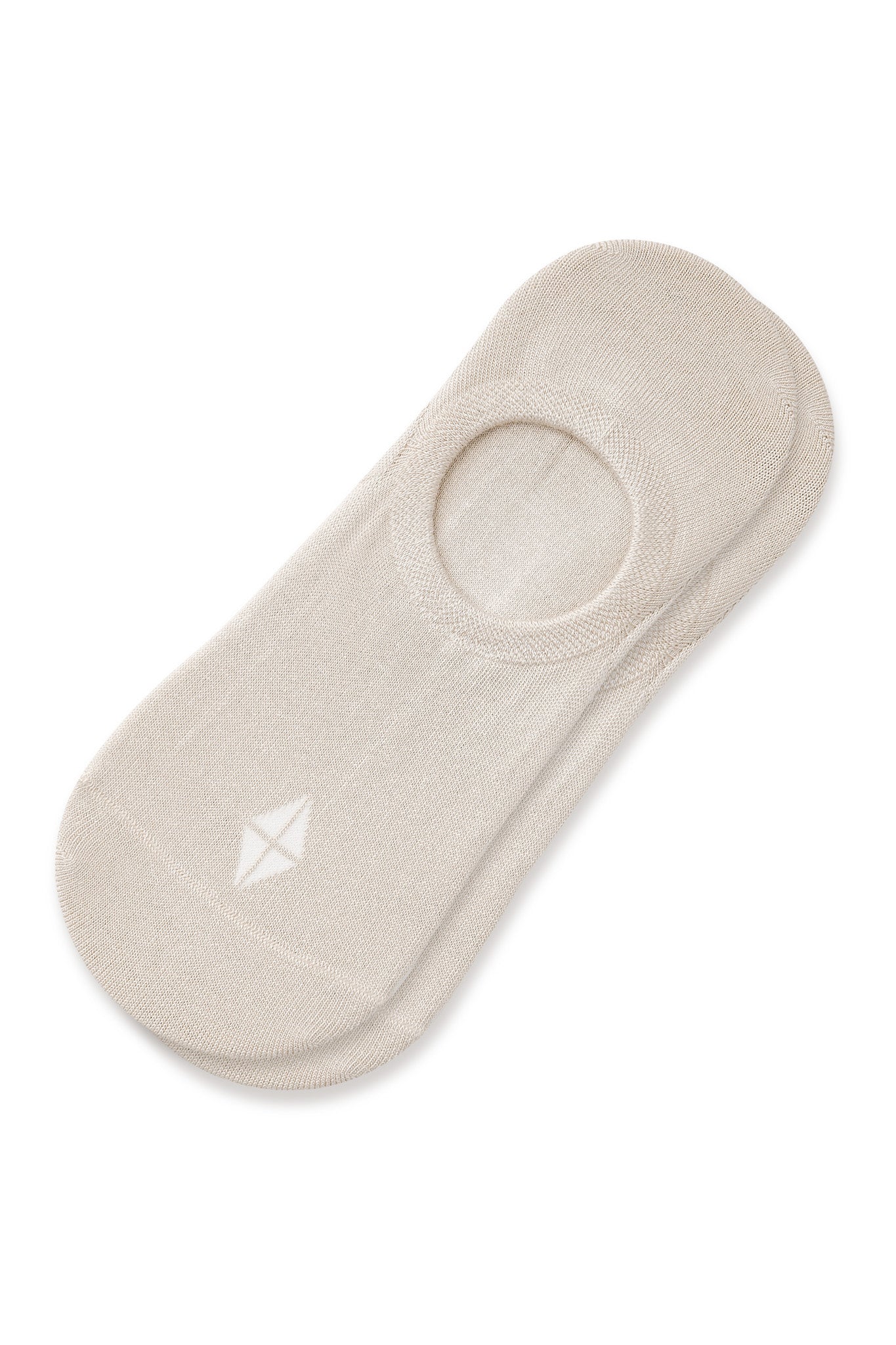 A single beige no-show sock with a small white geometric logo on the toe, displayed on a clean white background.