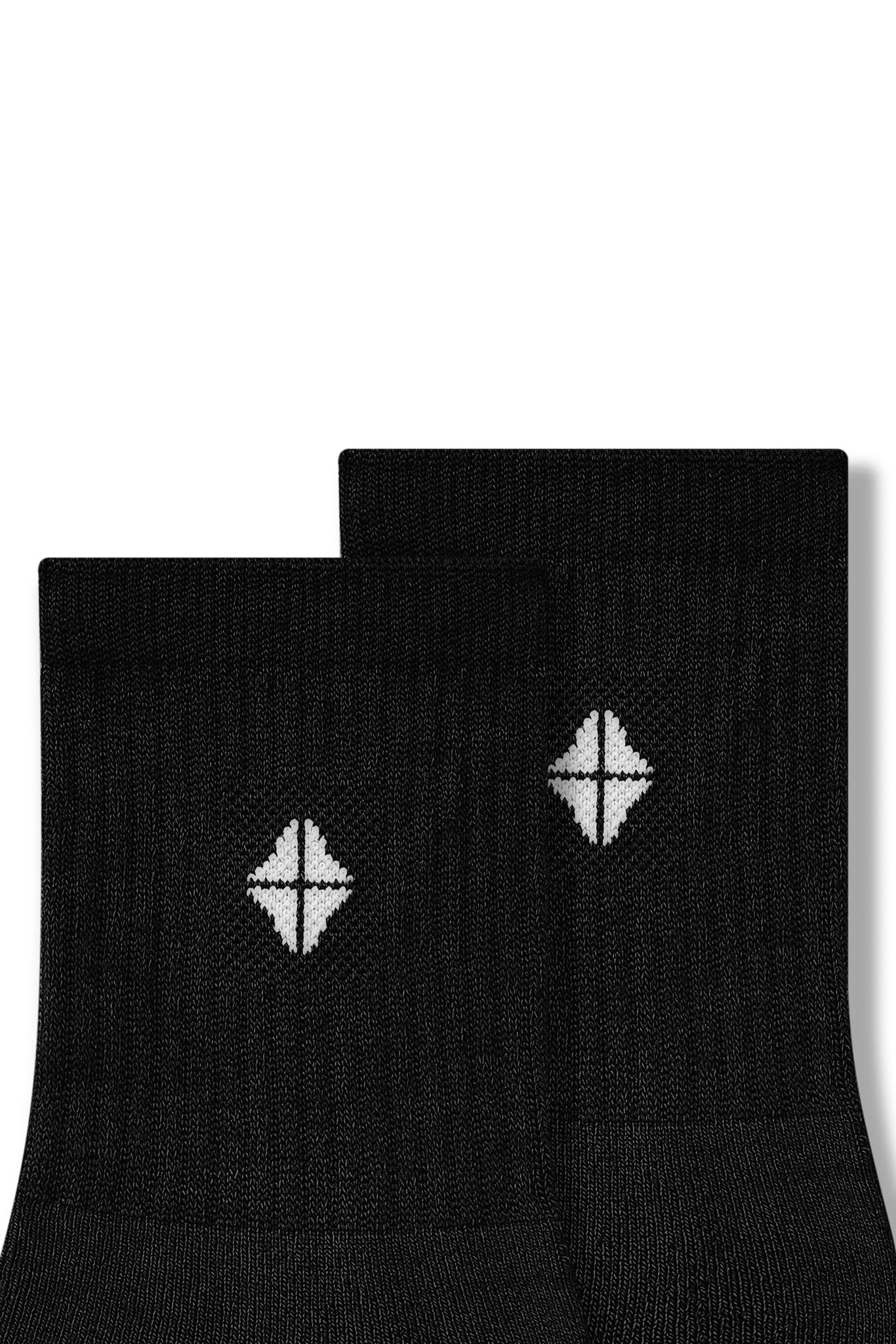 Close up of Adult Crew Socks in Midnight laying flat on a white background.