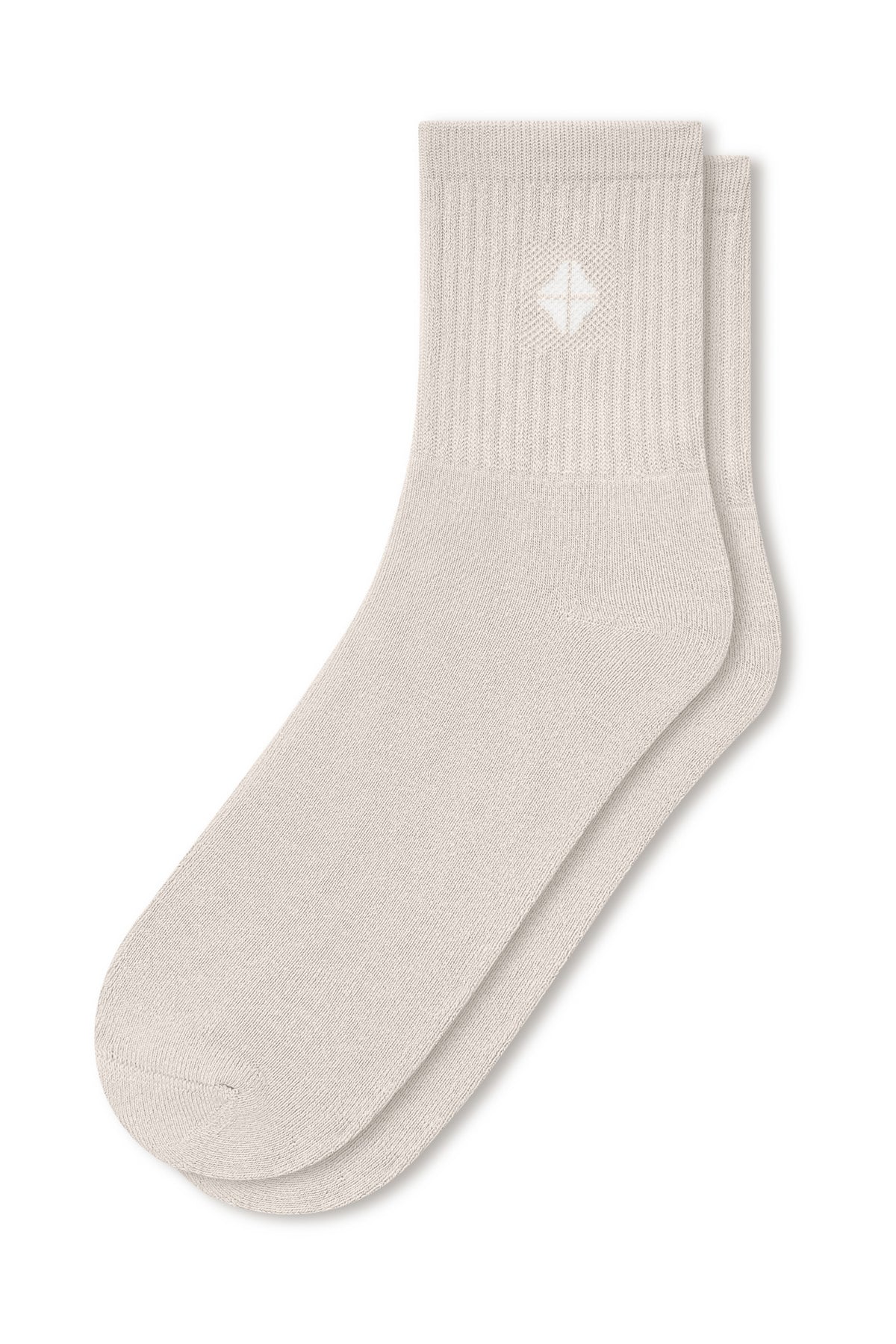 Adult Crew Socks in Oat laying flat on a white background.