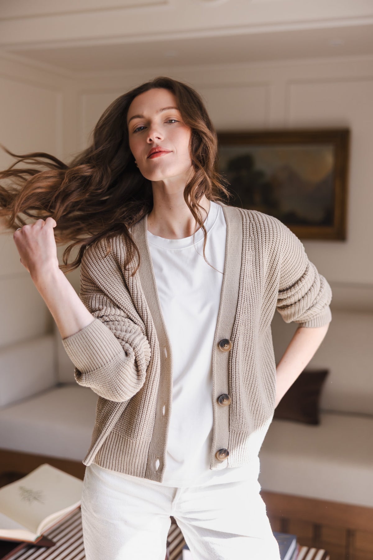 Modal posing in Chunky Knit Women's Cropped Cardigan in Almond