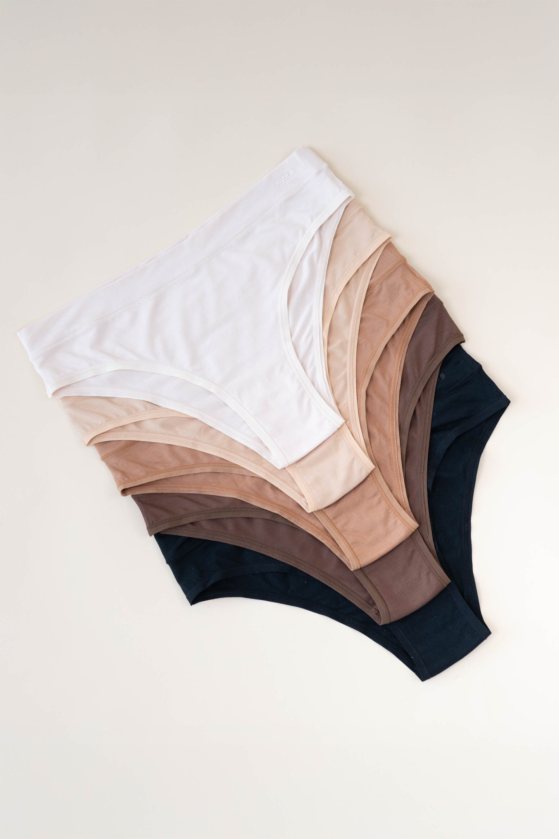Flat lay of the Women's Cheekini in neutral colors