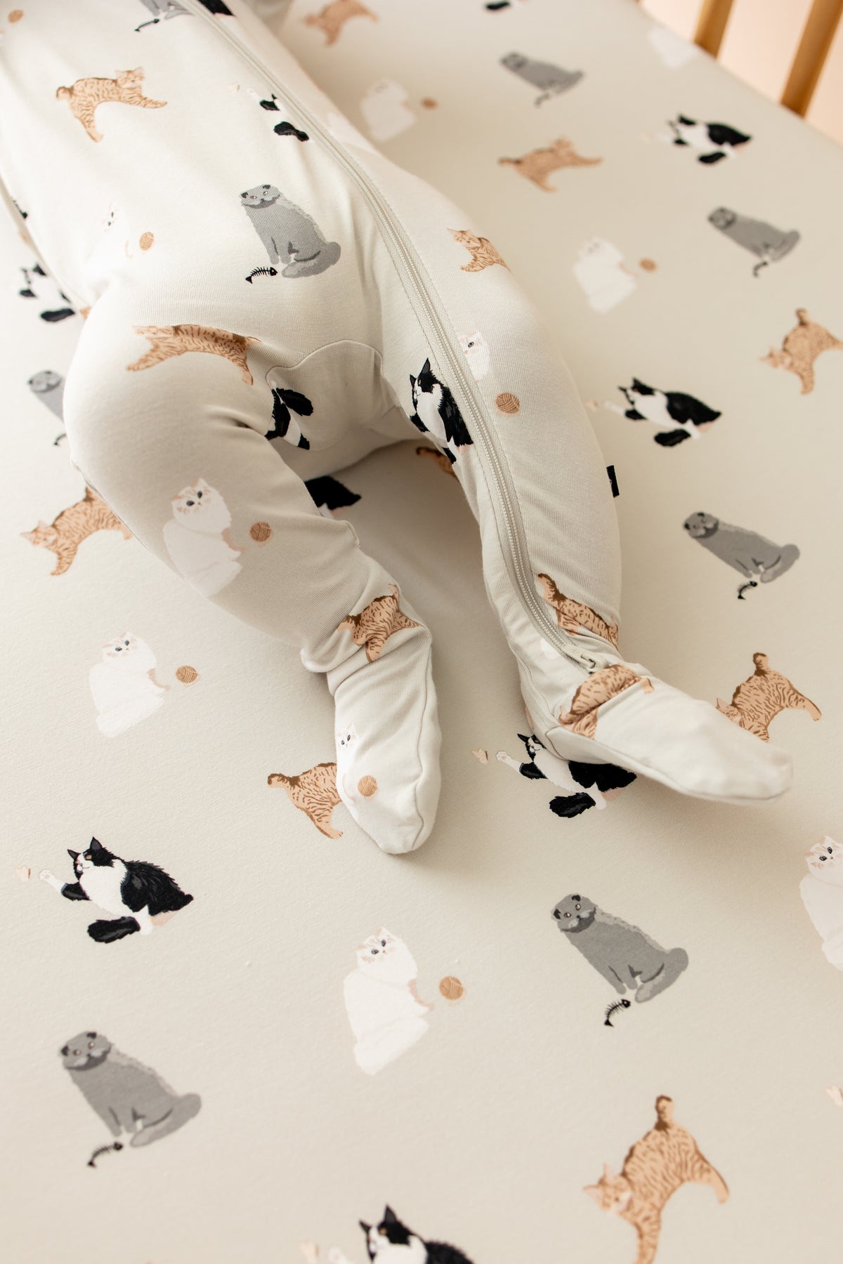Close up of the feet covers on the Zippered Footie in Fluffy Cat