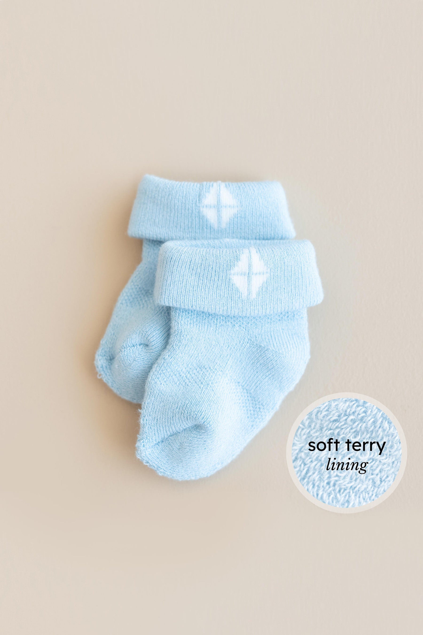 Blue infant socks with soft terry lining