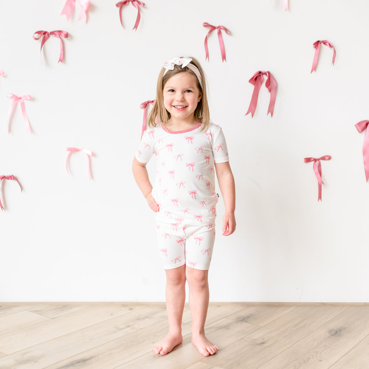 Toddler wearing Short Sleeve Pajamas in Bow