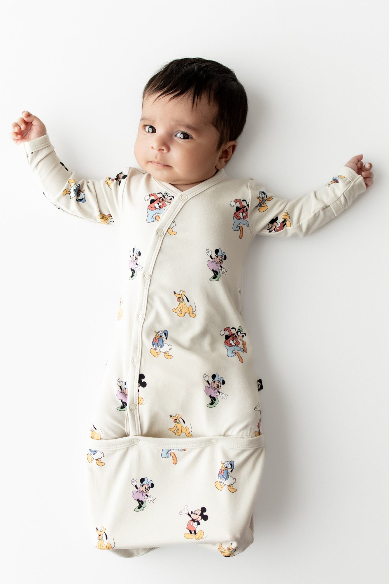 Baby in Mickey Mouse and Friend bundler on white background